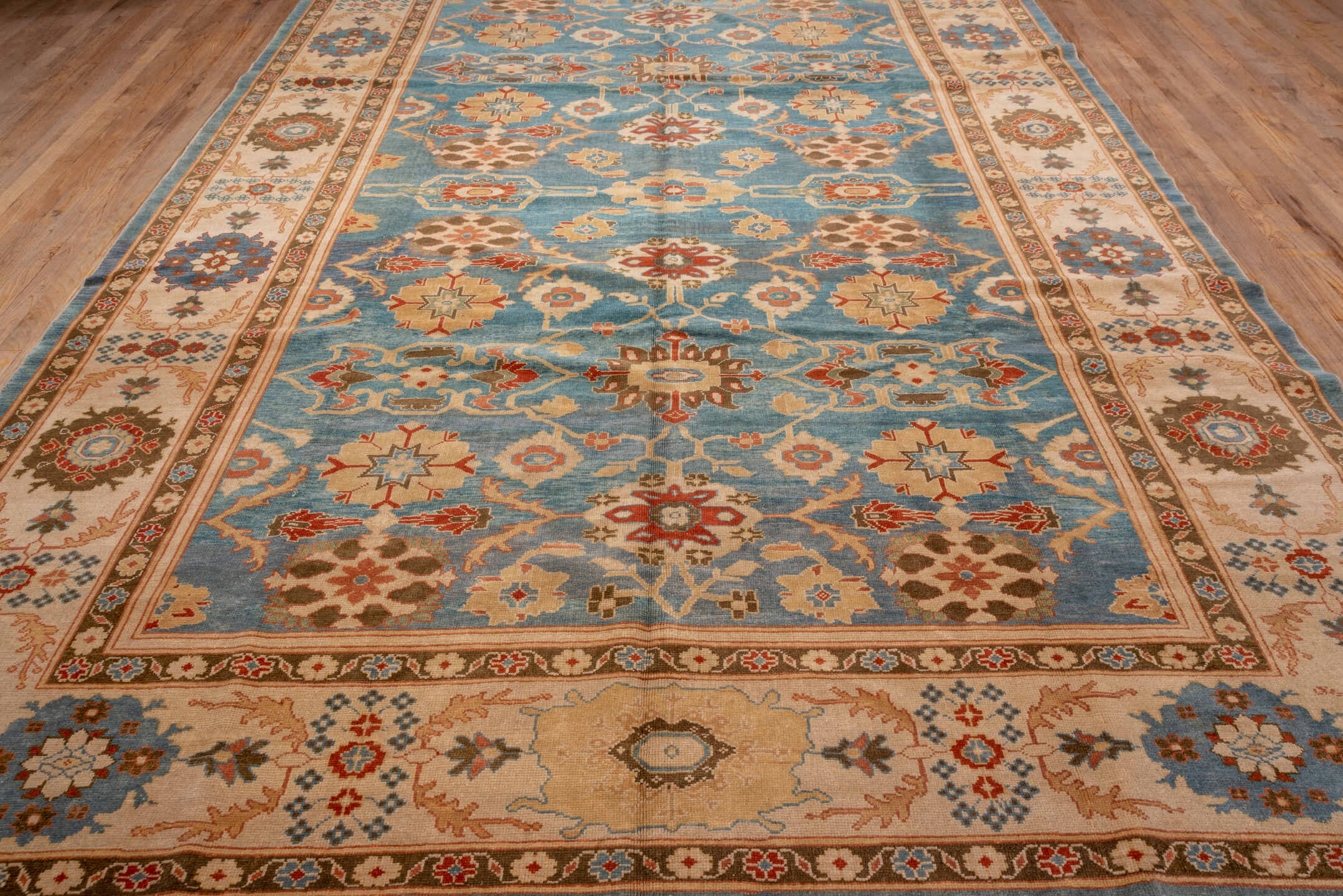 9' x 13' one-of-a-kind handmade vintage Sultanabad large size rug. Color palette: blue, ivory, camel, rust, brown, teal