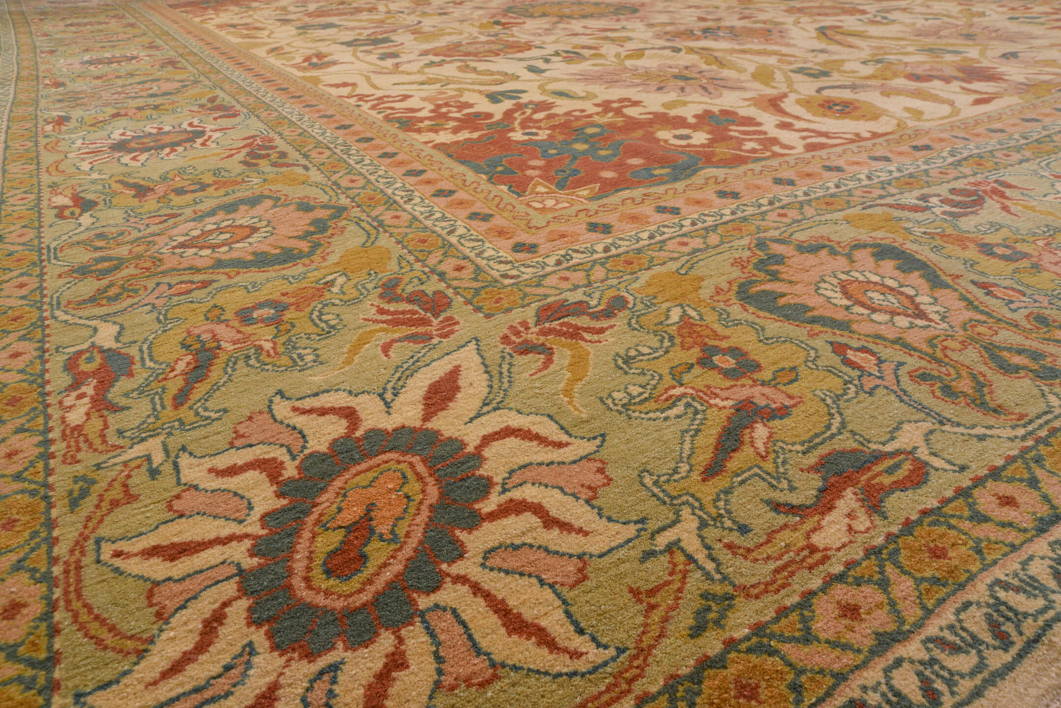 13' x 16' one-of-a-kind handmade vintage Sultanabad oversize rug. Color palette: ivory, beige, terra cotta, sage, gold, teal
