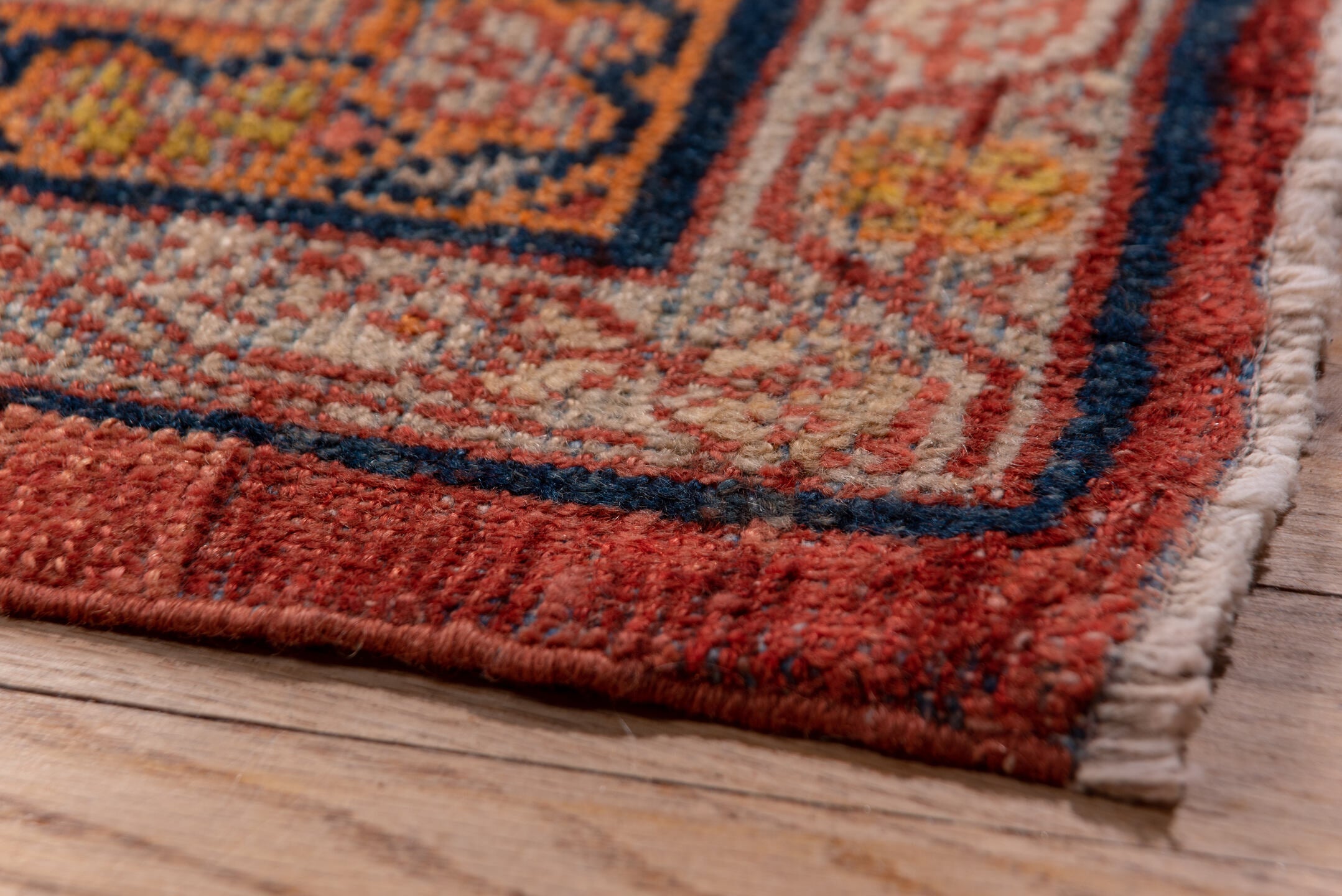 10' x 15' one-of-a-kind handmade antique Mahal rug. Color palette: terra cotta, navy, ivory, rust, gold, camel, sienna