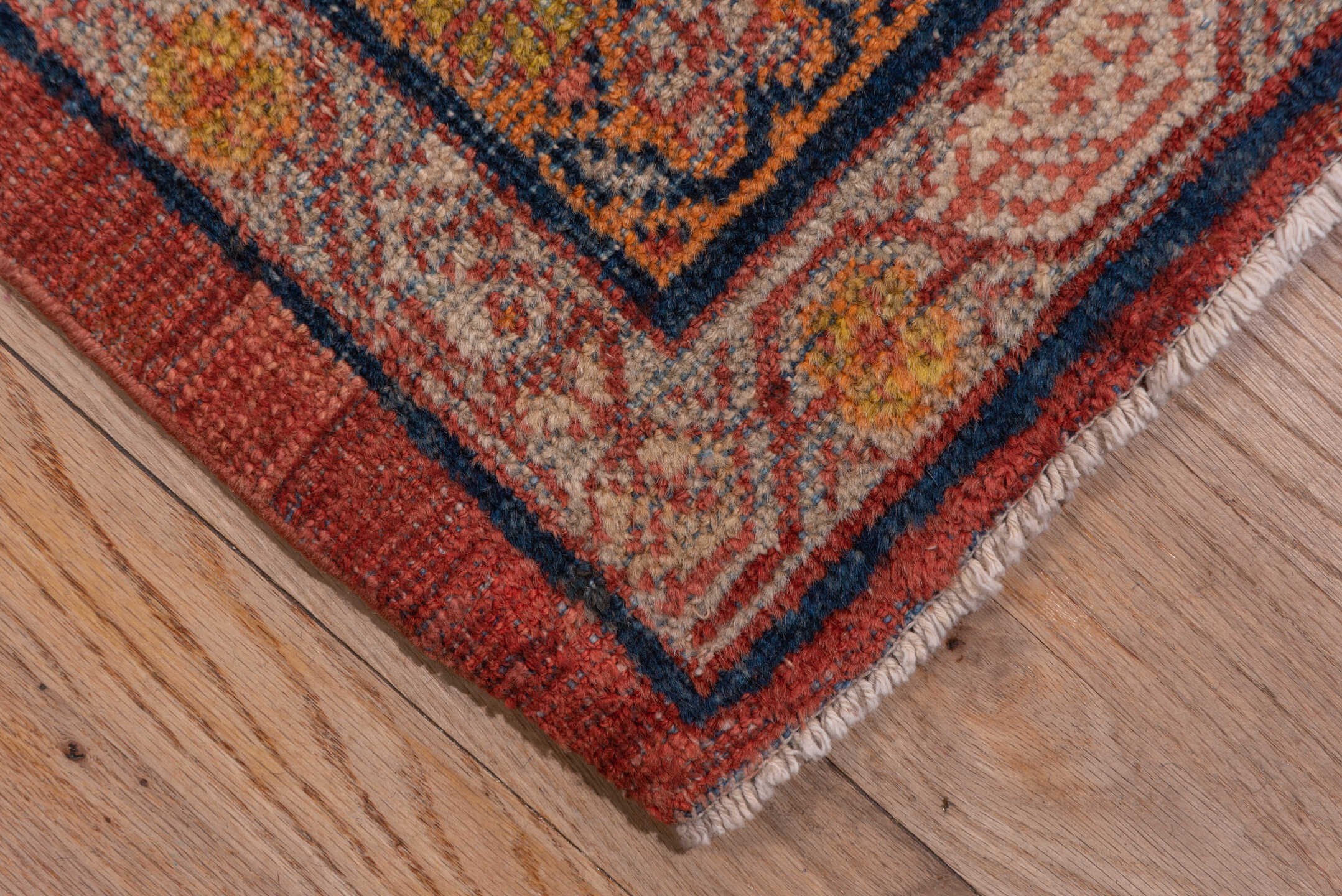 10' x 15' one-of-a-kind handmade antique Mahal rug. Color palette: terra cotta, navy, ivory, rust, gold, camel, sienna