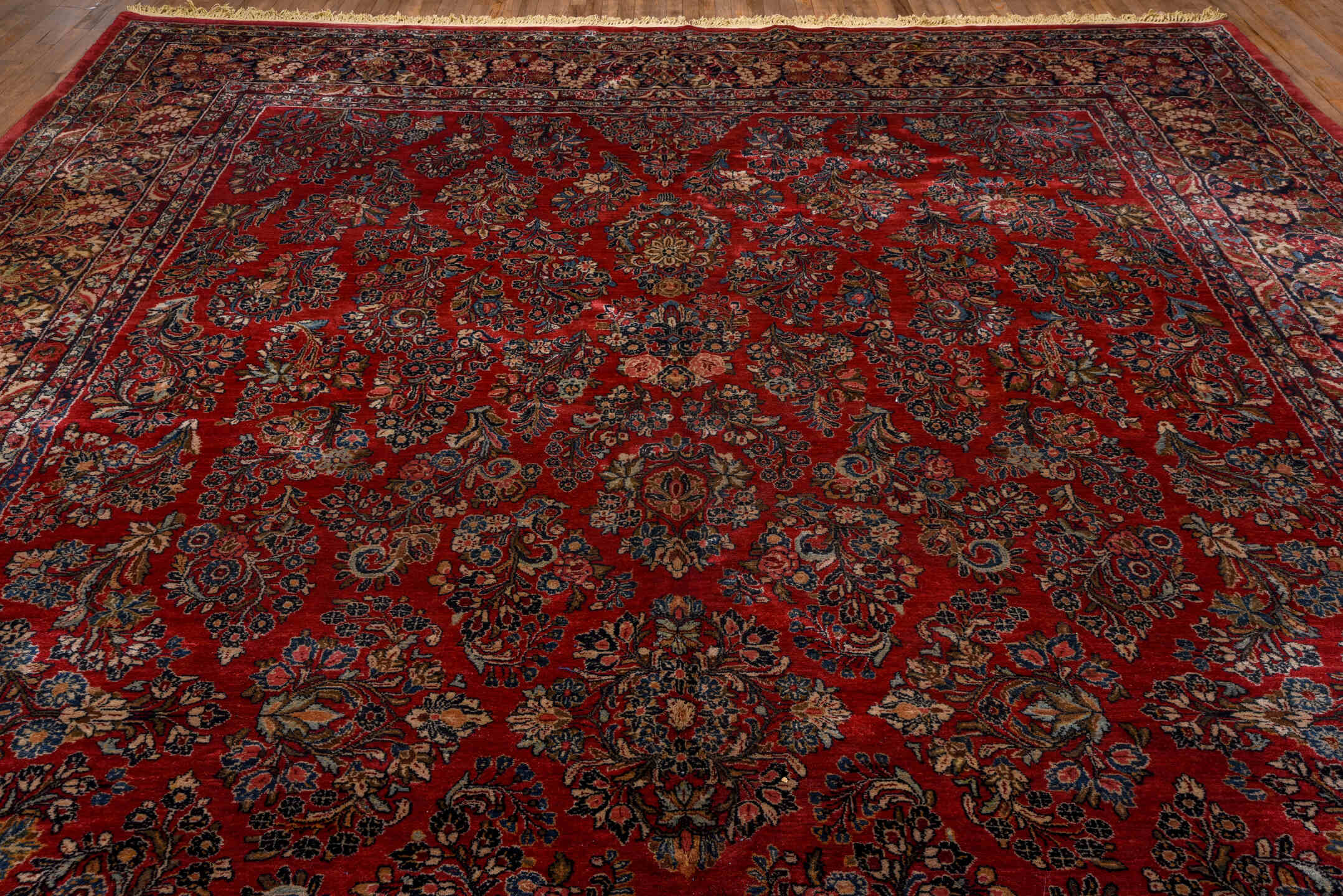 12' x 19' one-of-a-kind handmade vintage Sarouk oversize rug. Color palette: red, navy, ivory, rose, soft blue, burgundy