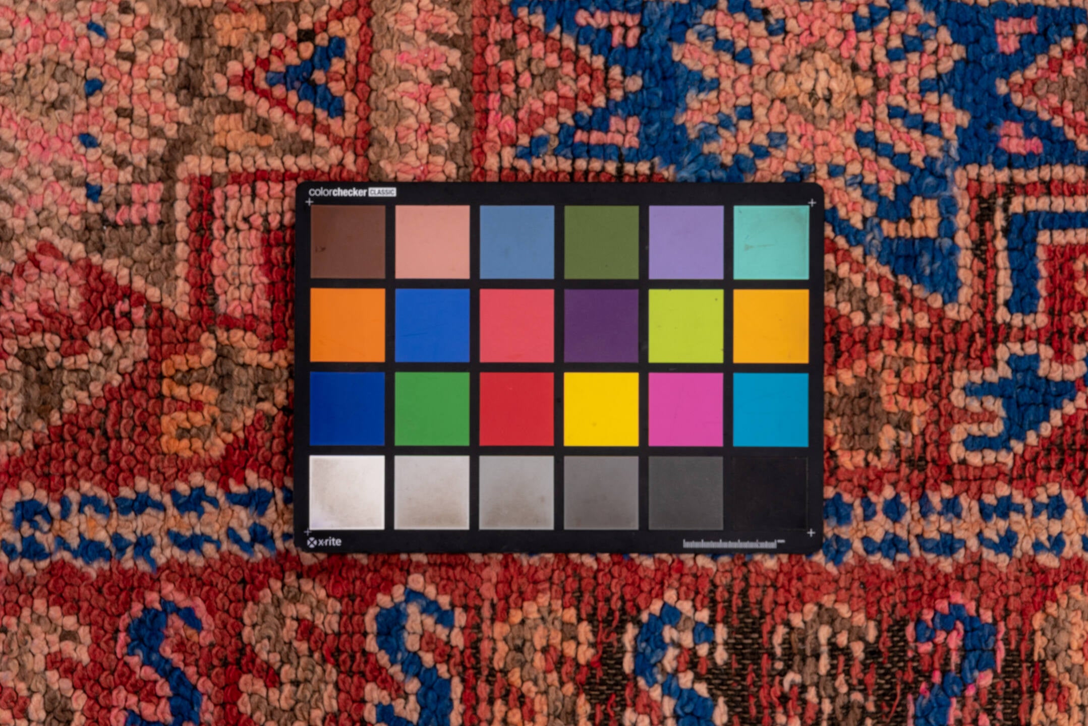 5' x 10' one-of-a-kind handmade vintage Moroccan medium size rug. Color palette: blue, brown, gray, pink, red, redwood