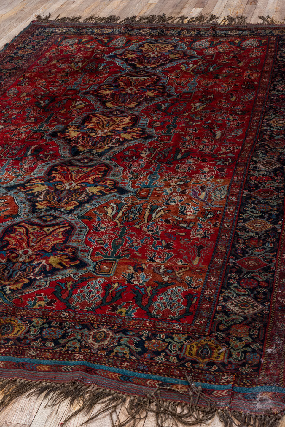 5' x 8' one-of-a-kind handmade antique Qashqai medium size rug. Color palette: red, navy, ivory, sky blue, rust, gold