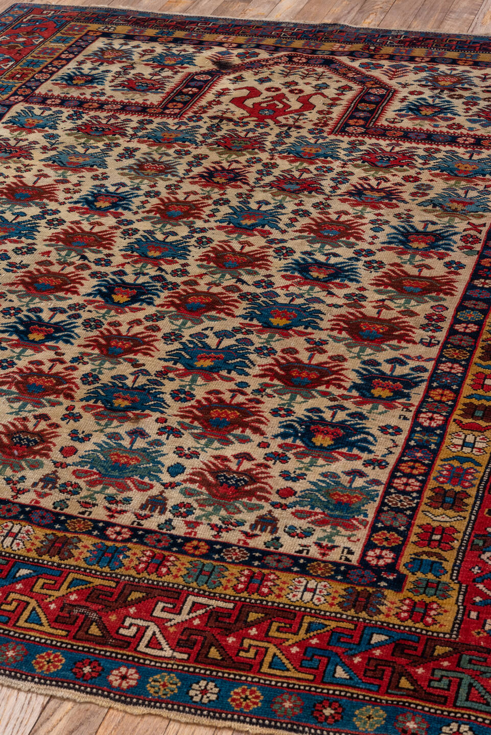 4' x 5' one-of-a-kind handmade vintage Shirvan small size rug. Color palette: arapawa, black, blue, brown, charcoal