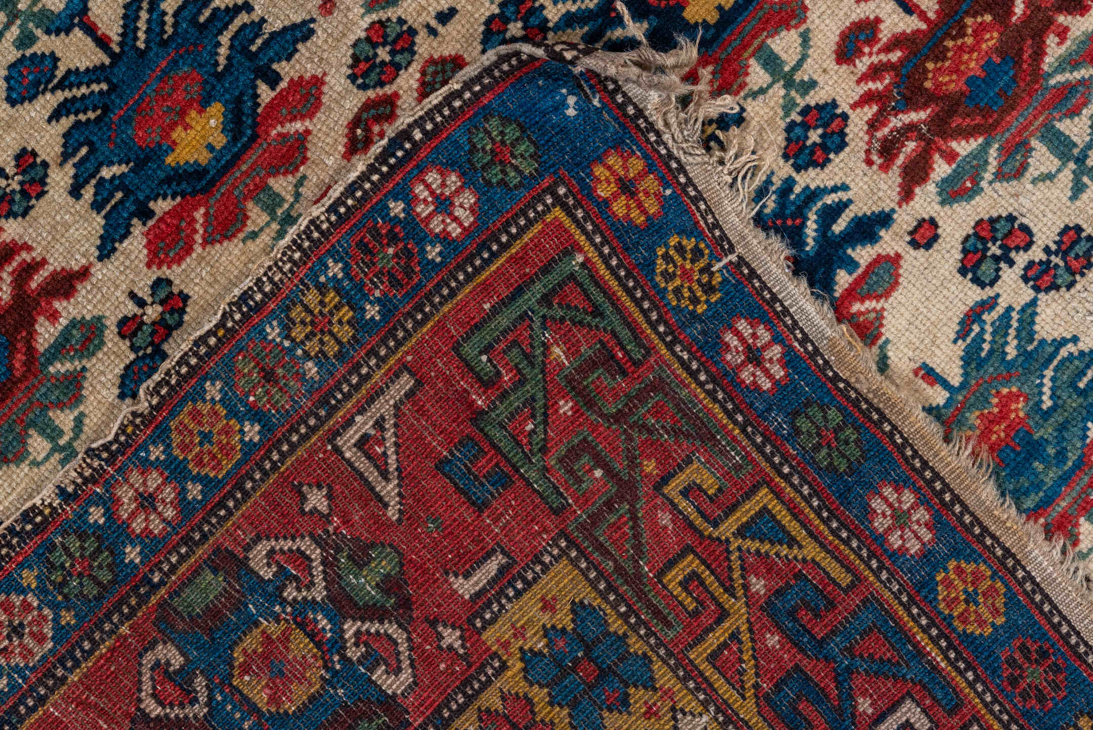 4' x 5' one-of-a-kind handmade vintage Shirvan small size rug. Color palette: arapawa, black, blue, brown, charcoal