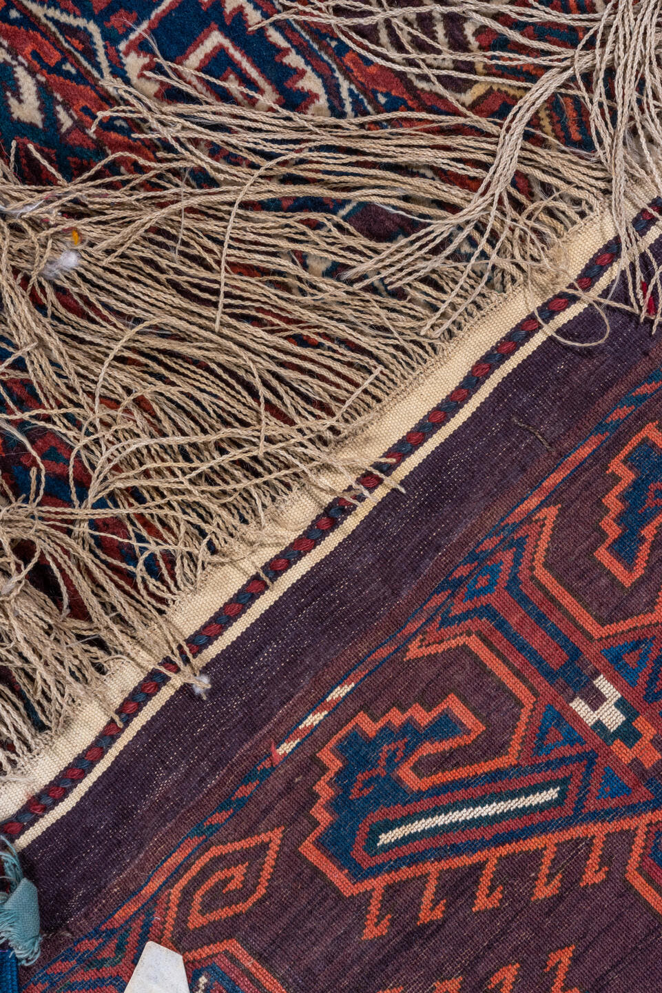 6' x 10' one-of-a-kind handmade vintage Yamoud large size rug. Color palette: burgundy, navy, rust, ivory, crimson, indigo