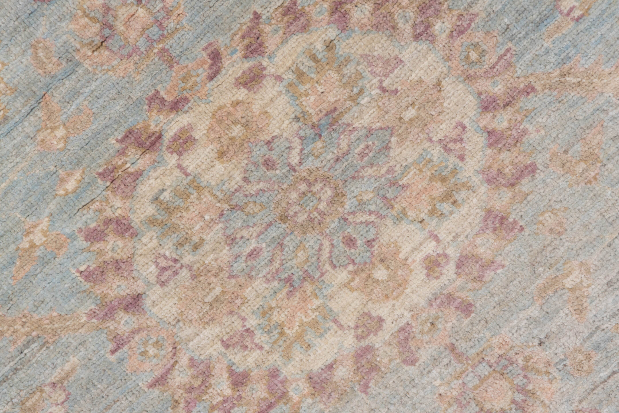 8' x 9' one-of-a-kind handmade vintage Afghan rug. Color palette: light blue, ivory, taupe, dusty rose, beige, lavender