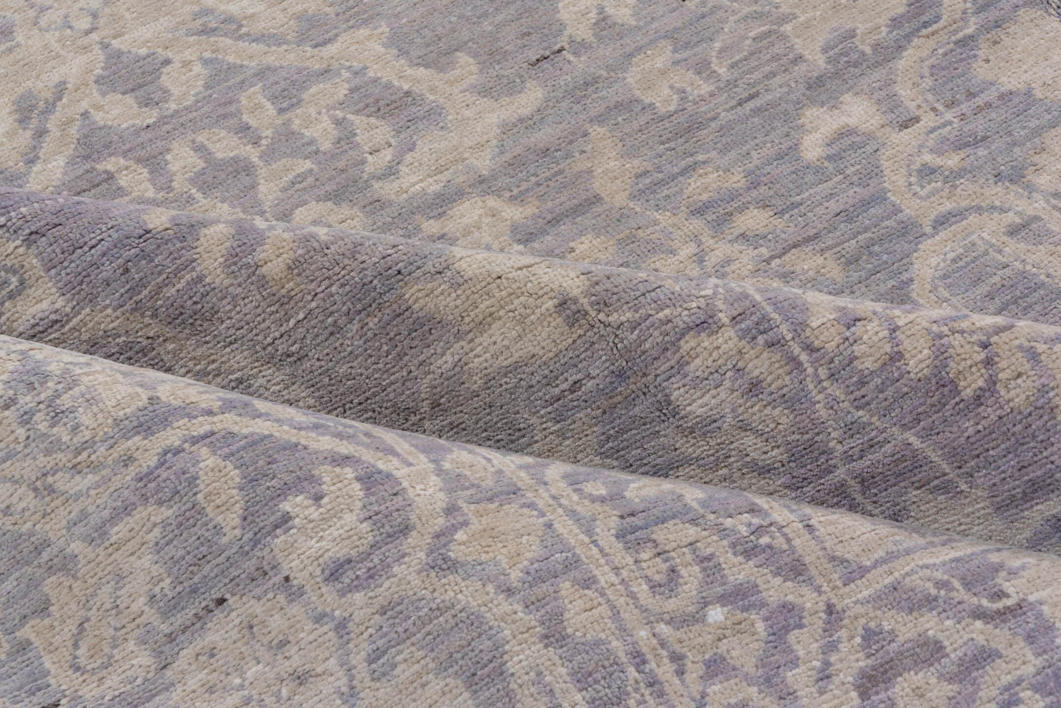 9' x 12' one-of-a-kind handmade vintage Afghan large size rug. Color palette: lavender, ivory, pale blue, taupe, light gray