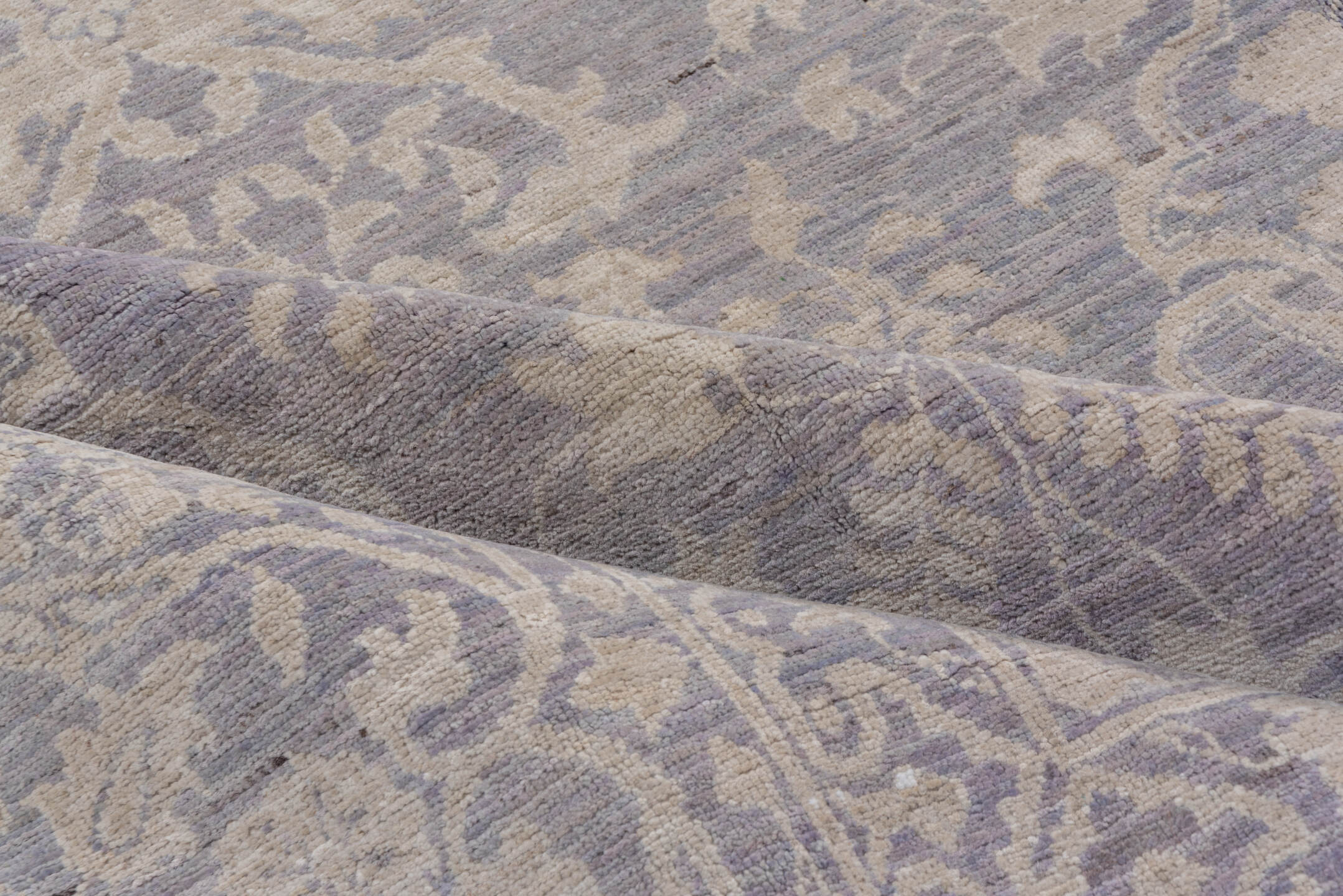 9' x 12' one-of-a-kind handmade vintage Afghan large size rug. Color palette: lavender, ivory, pale blue, taupe, light gray