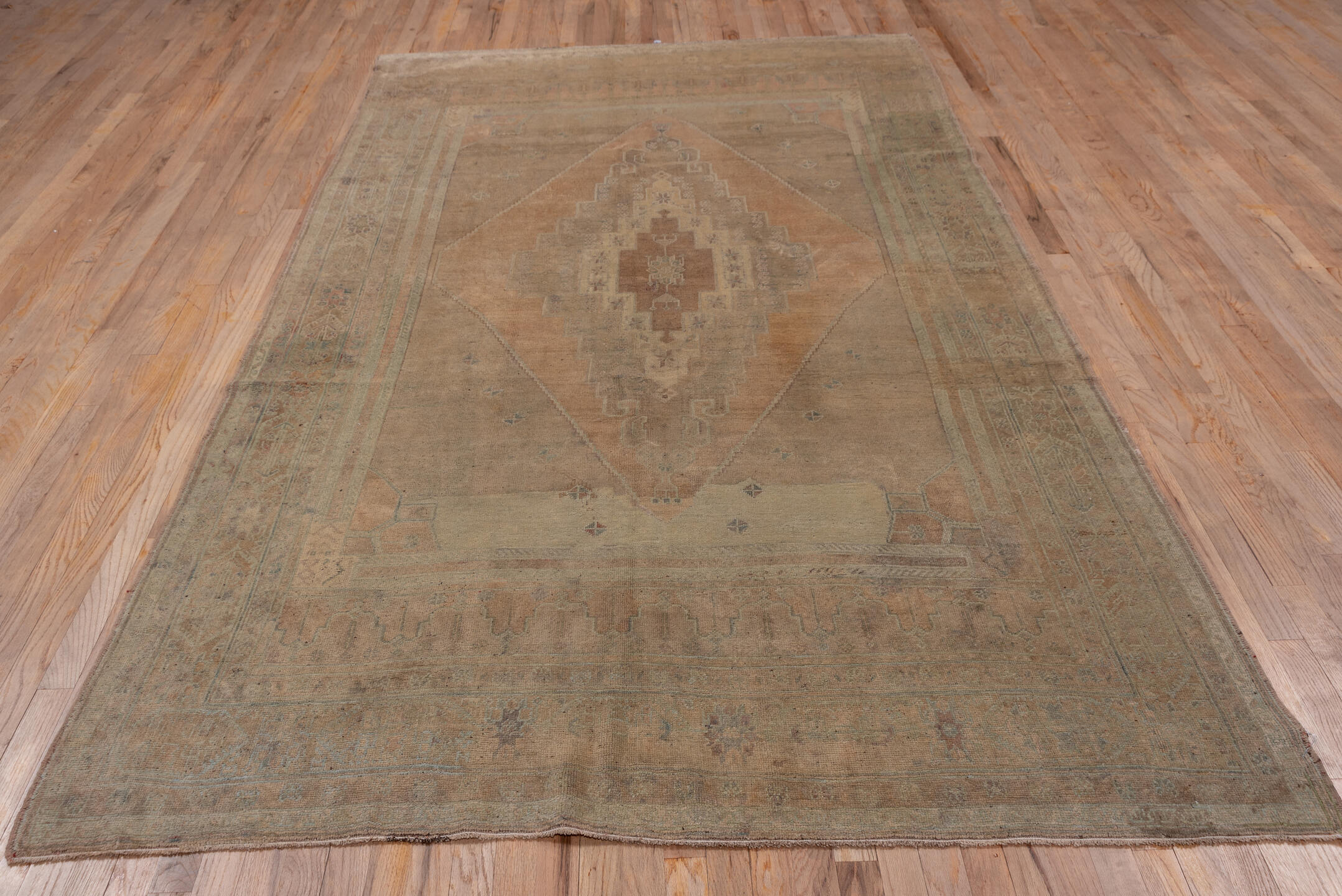 6' x 10' one-of-a-kind handmade vintage Oushak large size rug. Color palette: brown, gray, light gray, off-white, pink, snow