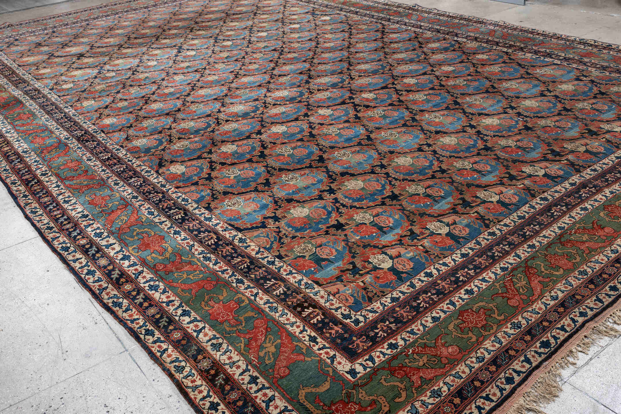 13' x 21' one-of-a-kind handmade vintage Bidjar oversize rug. Color palette: navy, sky blue, rust, ivory, sage, camel, blue