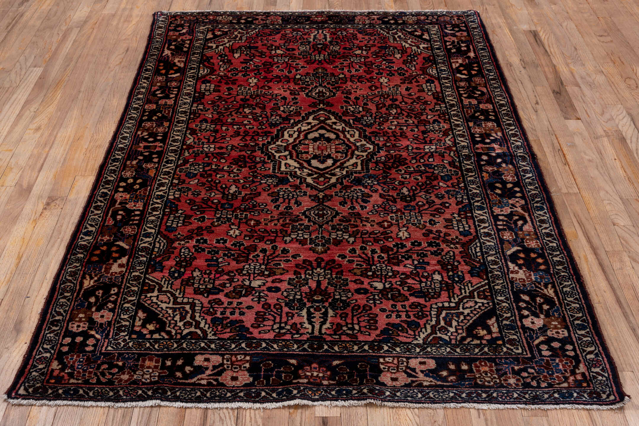 4' x 6' one-of-a-kind handmade vintage Lilian small size rug. Color palette: black, blue, brown, gray, pink, red, wine