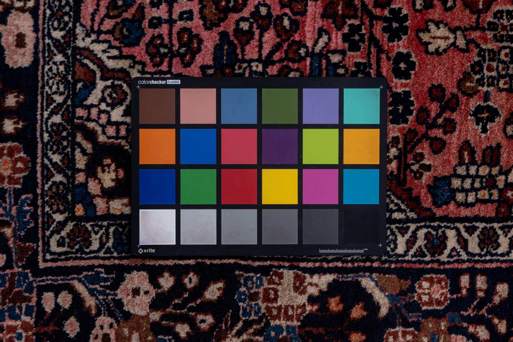 4' x 6' one-of-a-kind handmade vintage Lilian small size rug. Color palette: black, blue, brown, gray, pink, red, wine