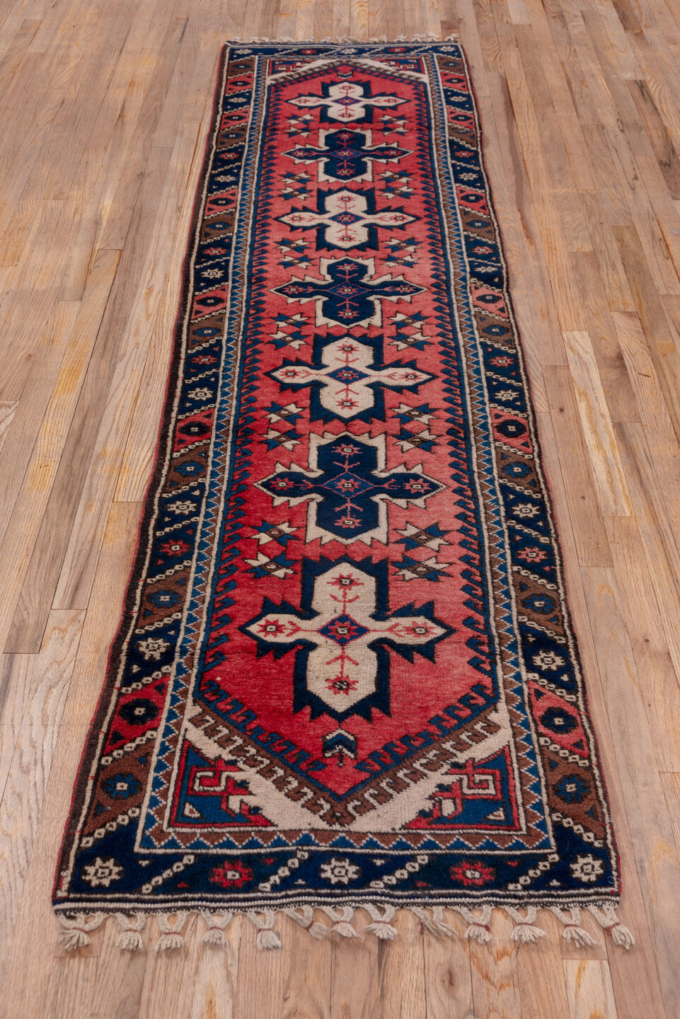 2' x 9' one-of-a-kind handmade vintage Oushak runner rug. Color palette: red, brown, gray, blue, pink, wine, redwood