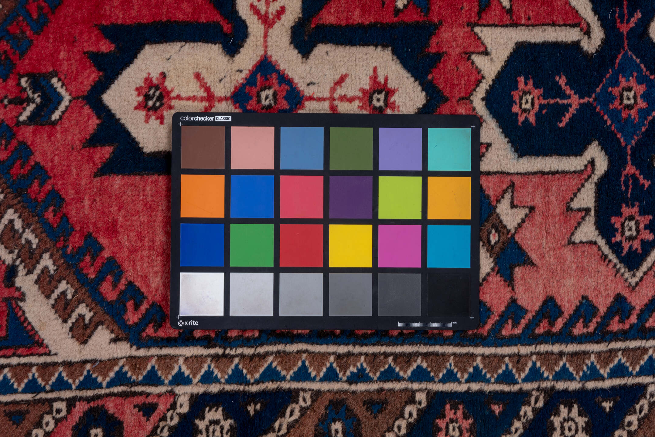 2' x 9' one-of-a-kind handmade vintage Oushak runner rug. Color palette: rose, navy, ivory, rust, brown, slate, pink, red