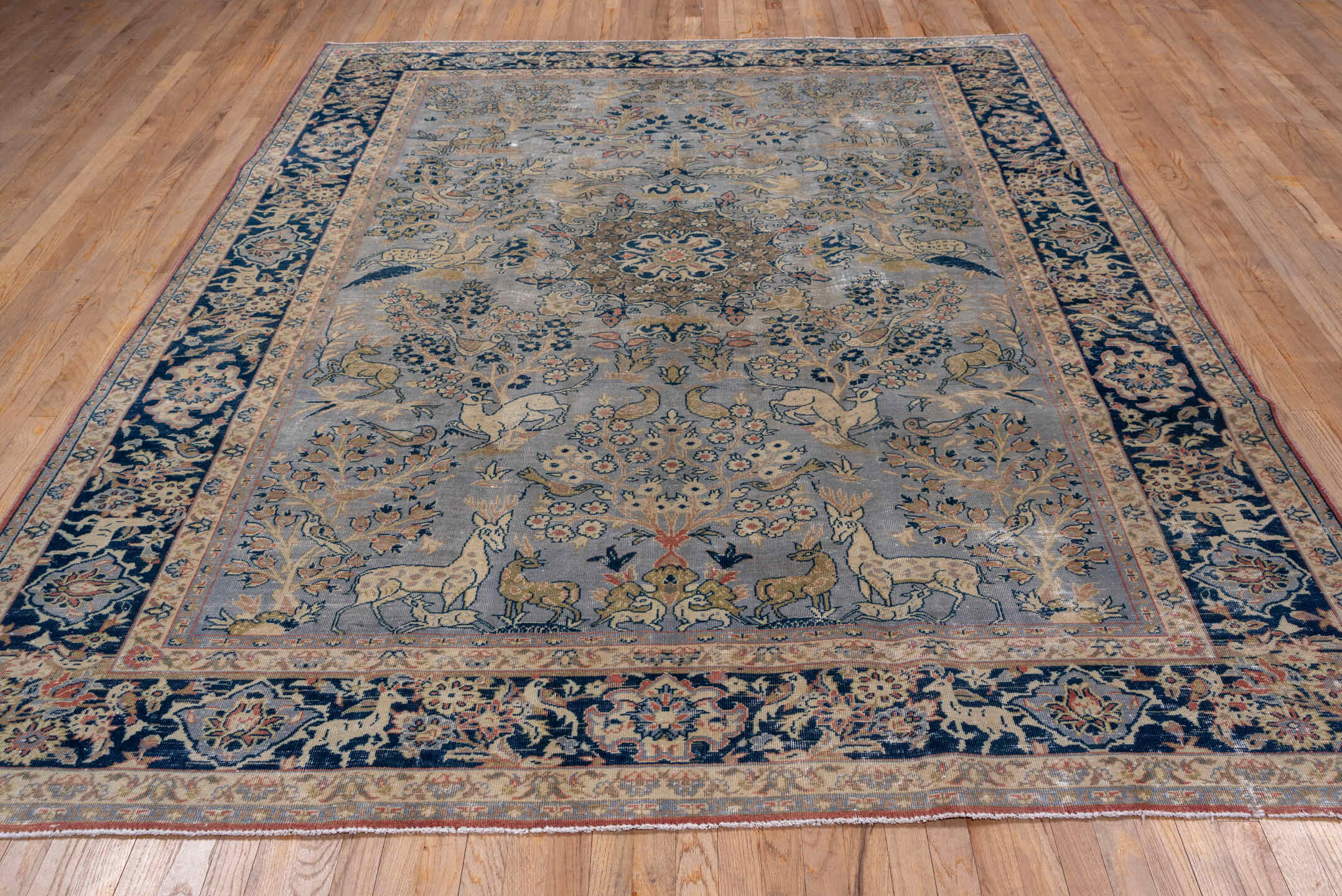 7' x 10' one-of-a-kind handmade vintage Tabriz large size rug. Color palette: light blue, navy, ivory, beige, taupe, gold