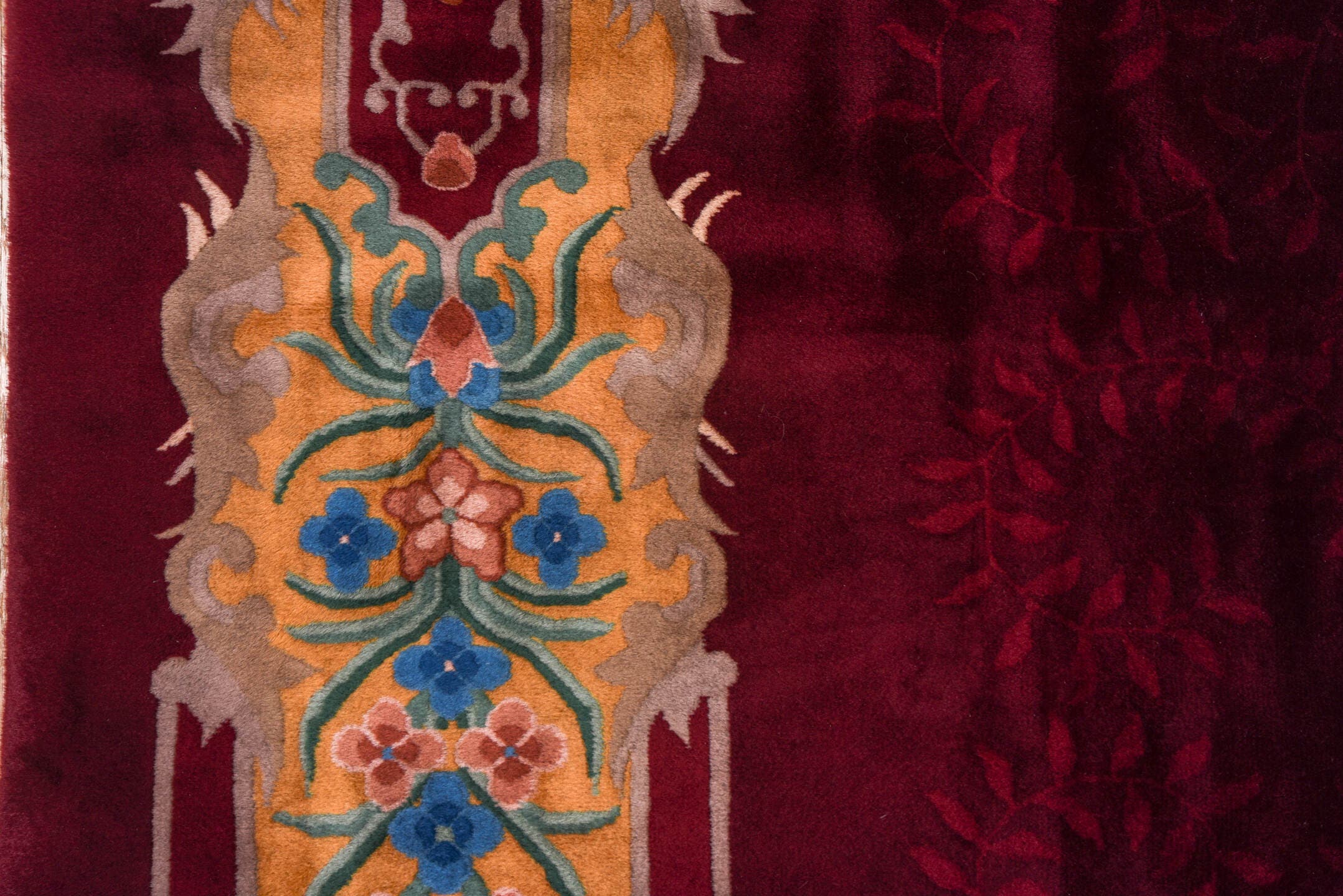 10' x 17' one-of-a-kind handmade antique Chinese rug. Color palette: burgundy, gold, ivory, blue, rose, taupe, pink, red