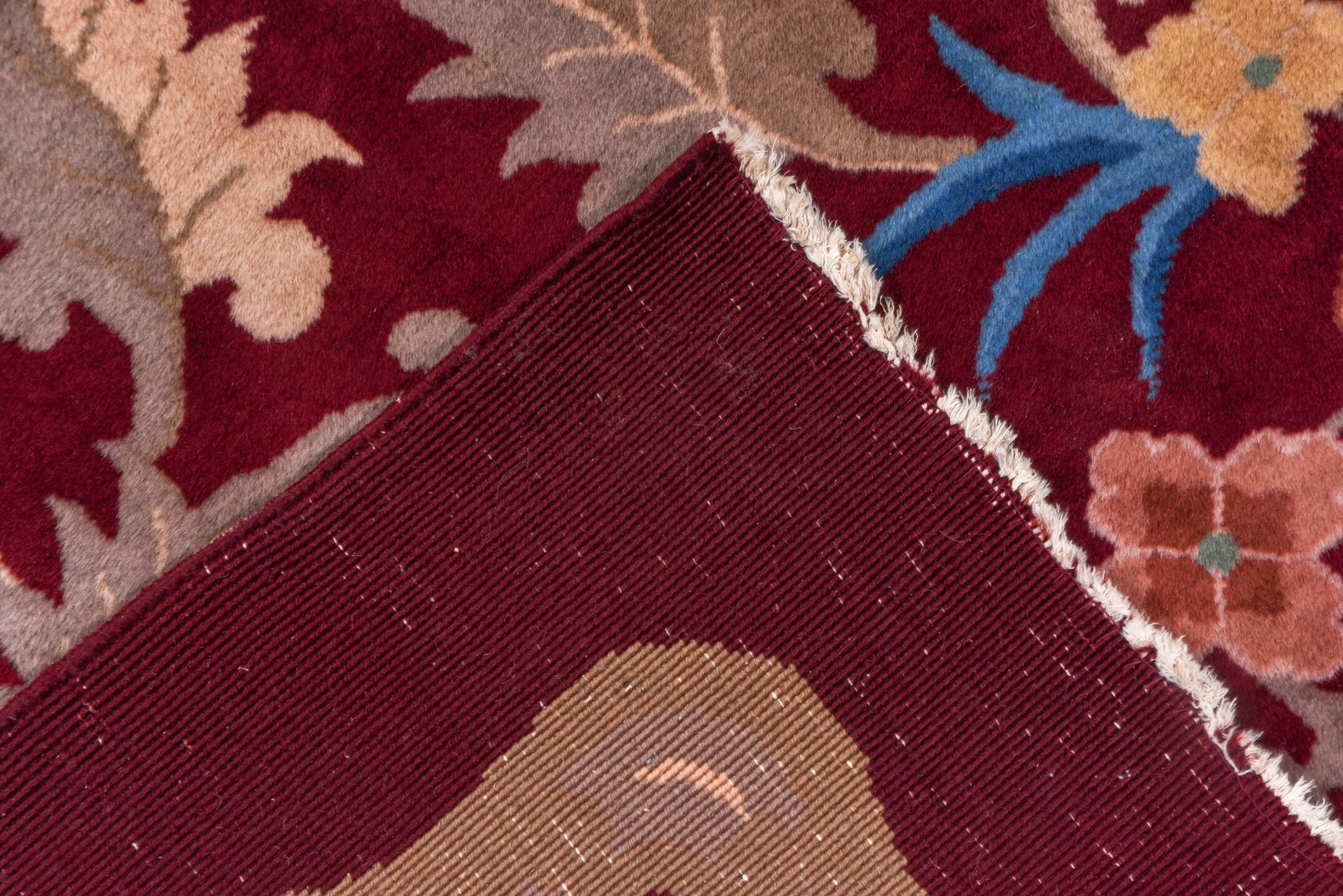 10' x 17' one-of-a-kind handmade antique Chinese rug. Color palette: burgundy, gold, ivory, blue, rose, taupe, pink, red