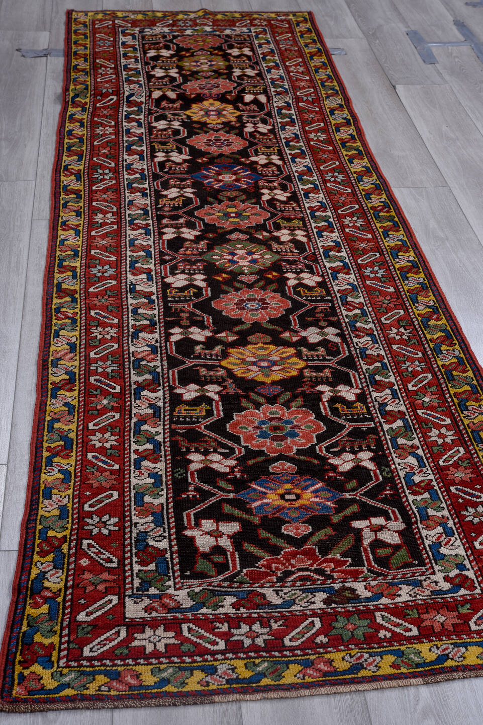 3' x 10' one-of-a-kind handmade vintage Karabagh runner rug. Color palette: black, crimson, ivory, gold, blue, rose, olive