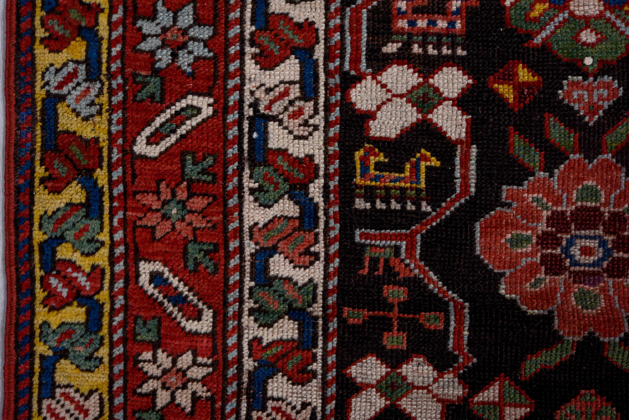 3' x 10' one-of-a-kind handmade vintage Karabagh runner rug. Color palette: black, crimson, ivory, gold, blue, rose, olive