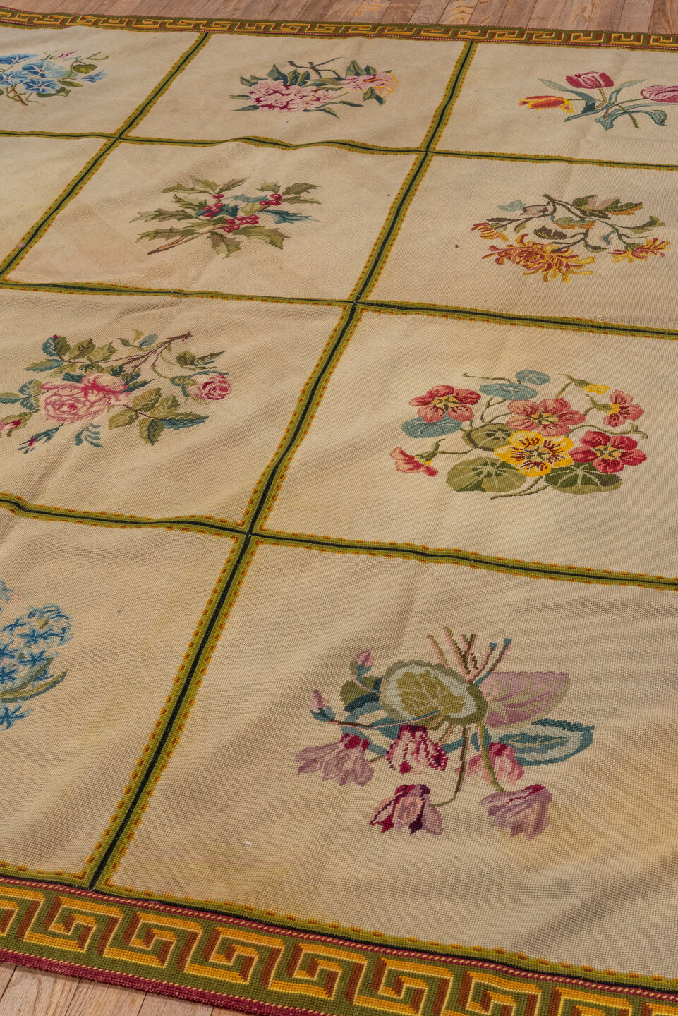 6' x 7' one-of-a-kind handmade vintage Needlepoint rug. Color palette: black, blue, brown, gray, pink, red, yellow