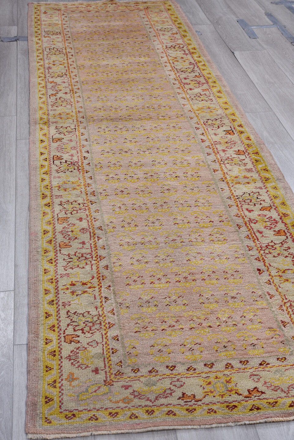 3' x 11' one-of-a-kind handmade antique Oushak runner rug. Color palette: ivory, blush, gold, rose, rust, taupe, pink, red
