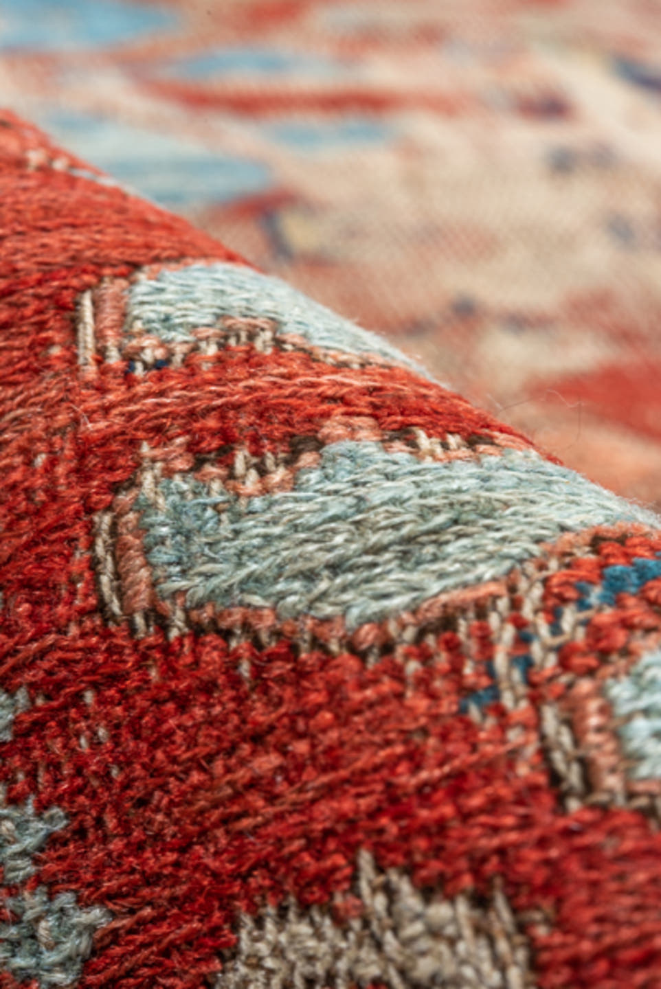 8' x 9' one-of-a-kind handmade antique Sumak rug. Color palette: rust, navy, ivory, sky blue, camel, crimson, terracotta