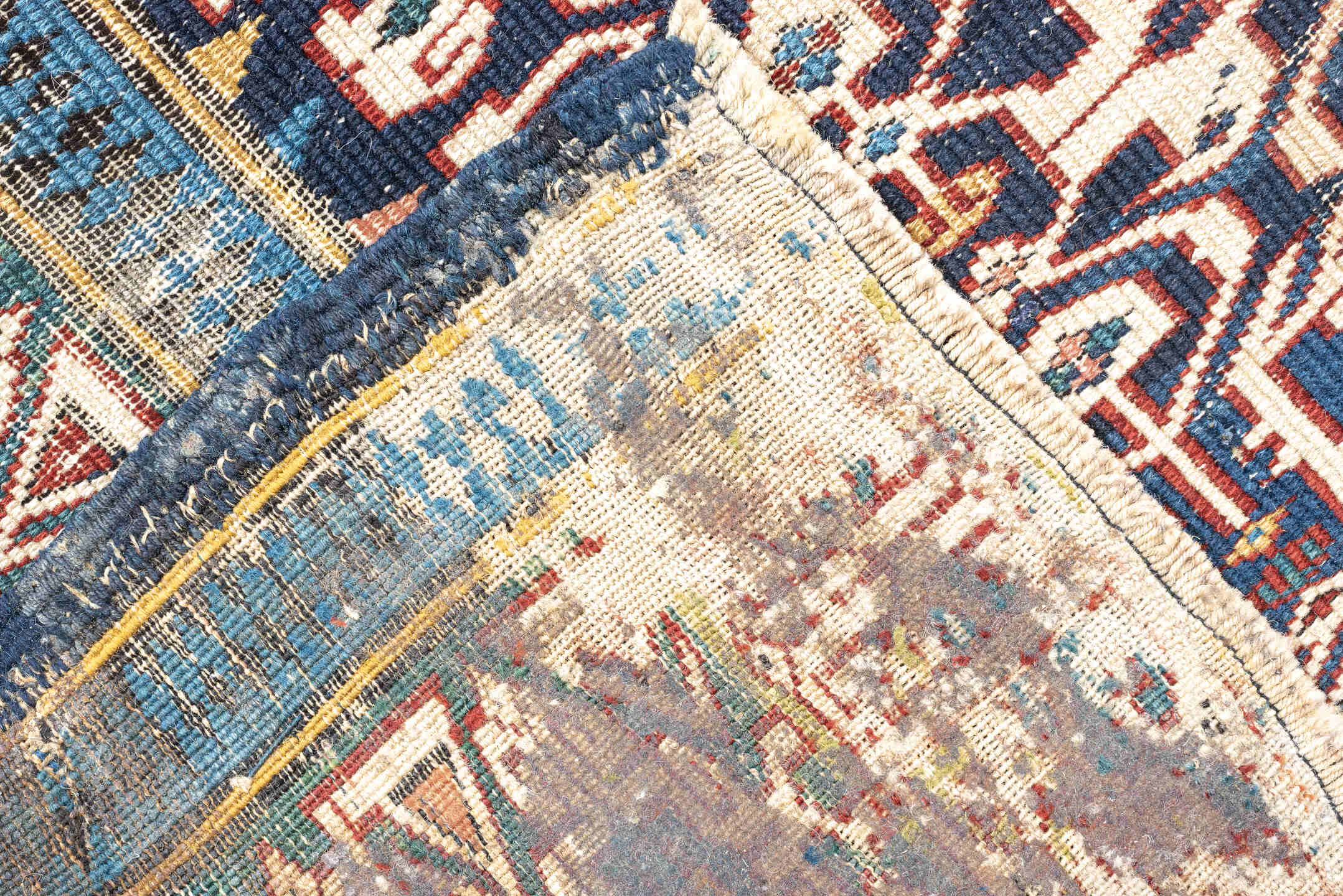 3' x 10' one-of-a-kind handmade antique Kuba runner rug. Color palette: indigo, ivory, rust, sky blue, camel, slate, purple
