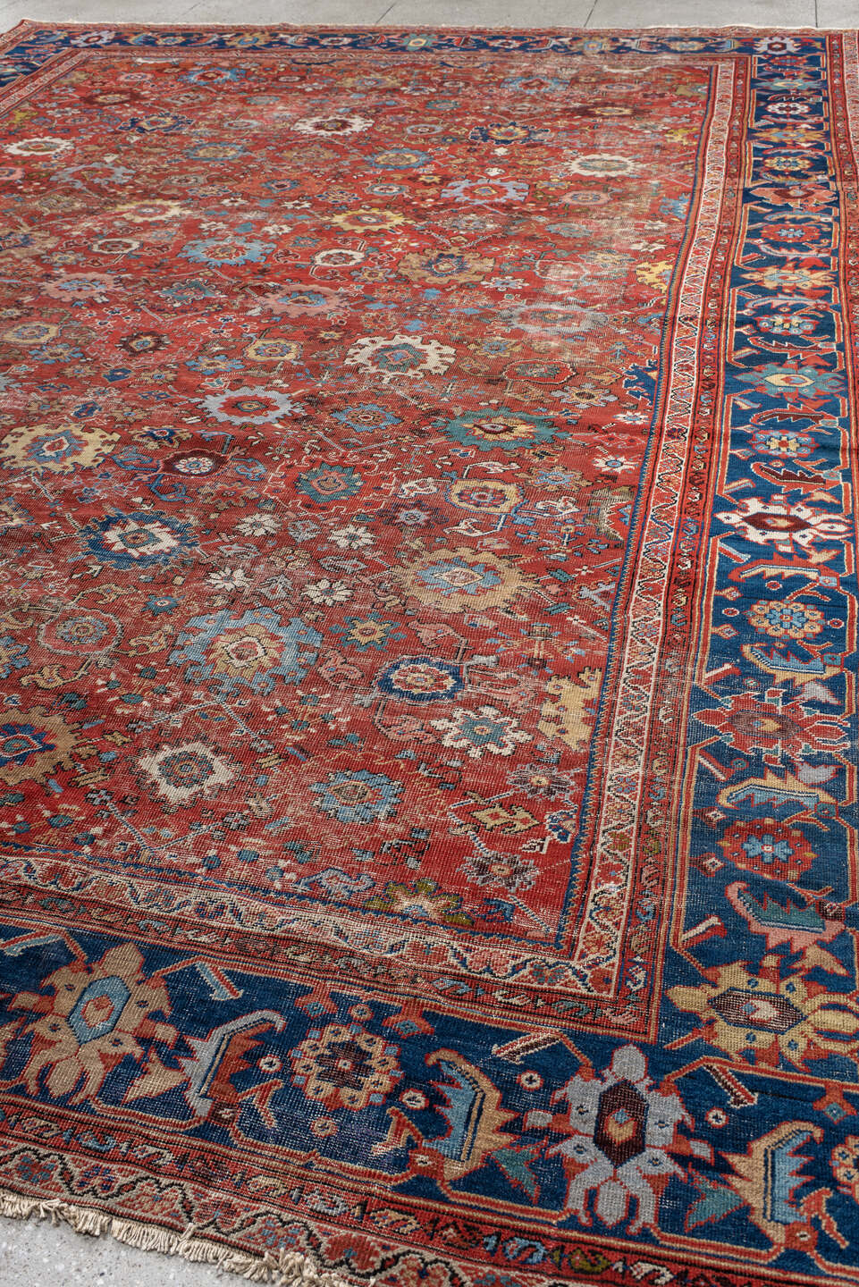 12' x 17' one-of-a-kind handmade vintage Sultanabad oversize rug. Color palette: rust, navy, ivory, sky blue, terracotta