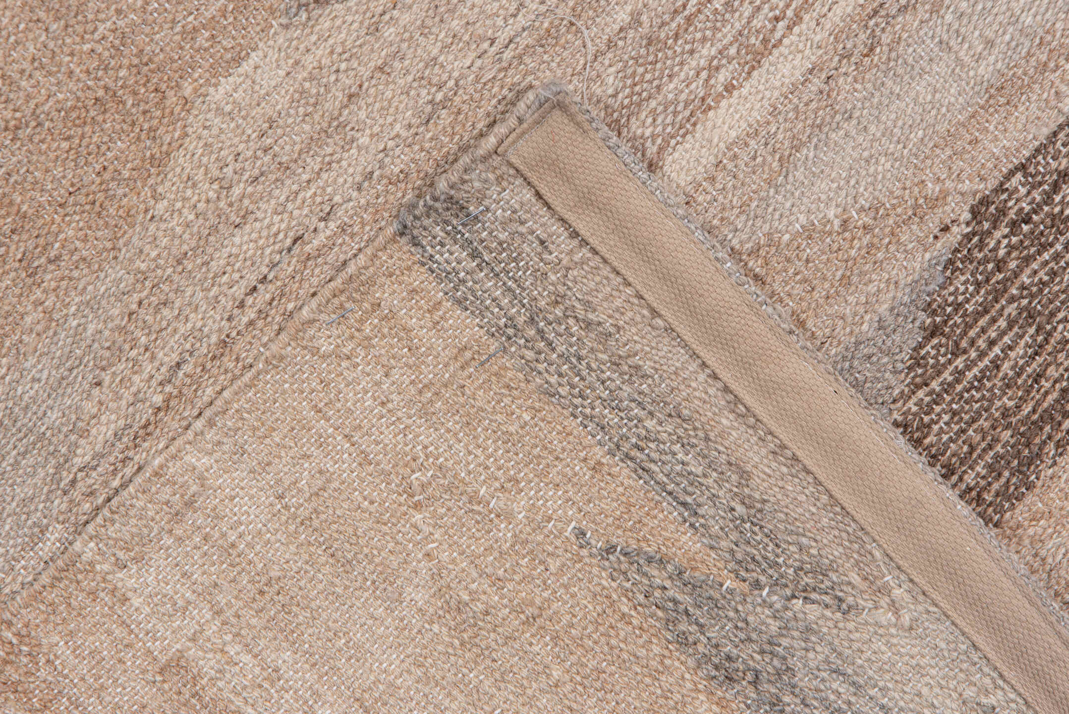 10' x 16' one-of-a-kind handmade vintage Kilim rug. Color palette: brown, gray, light gray, off-white, pink