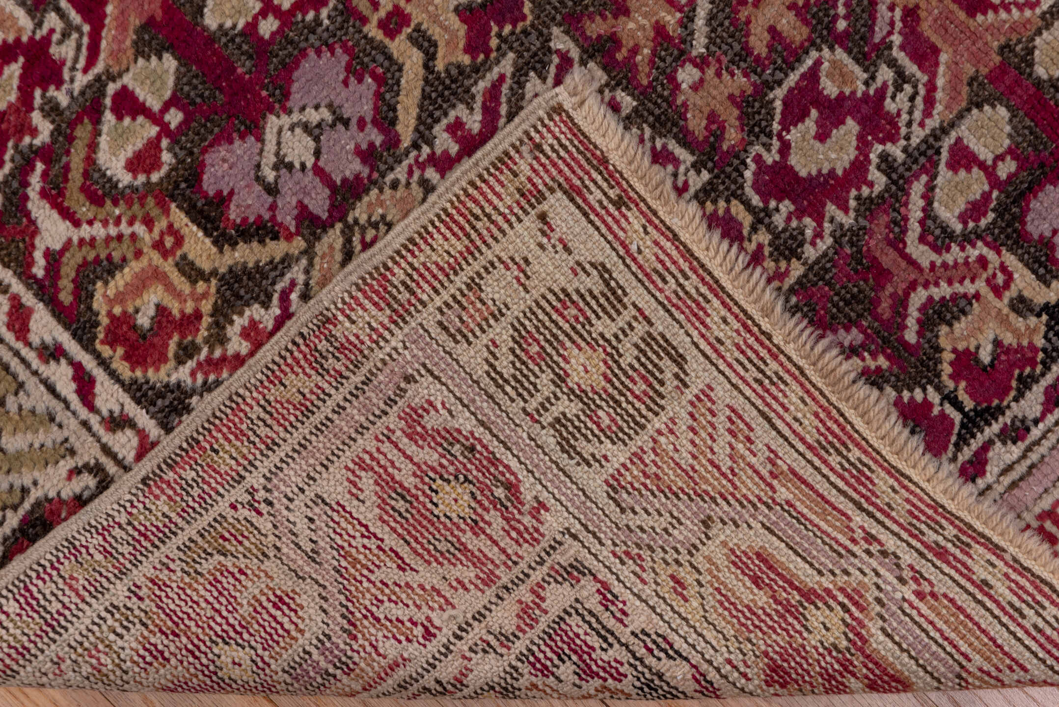 6' x 11' one-of-a-kind handmade vintage Ghordes large size rug. Color palette: brown, gray, off-white, pink, red, snow