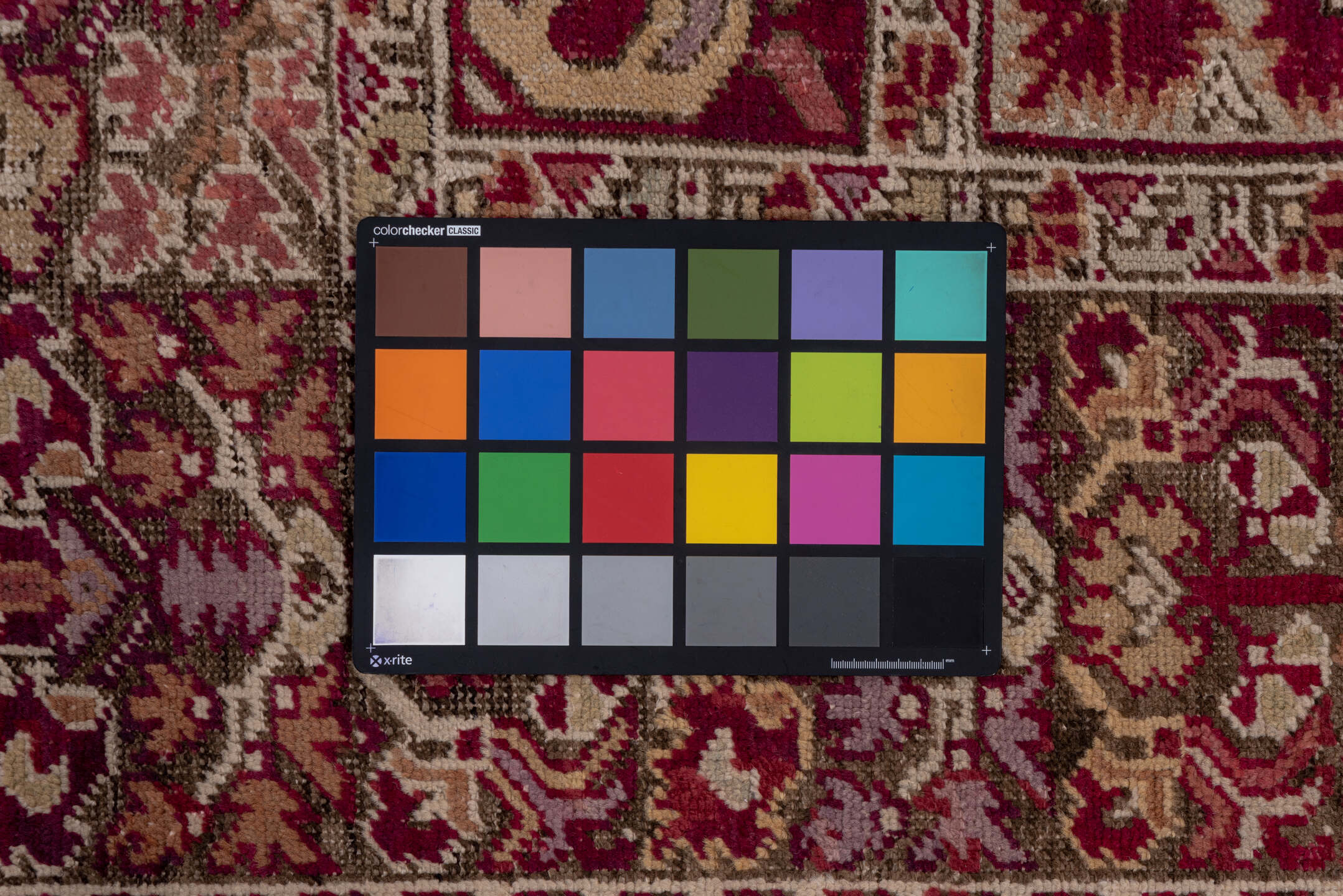 6' x 11' one-of-a-kind handmade vintage Ghordes large size rug. Color palette: brown, gray, off-white, pink, red, snow