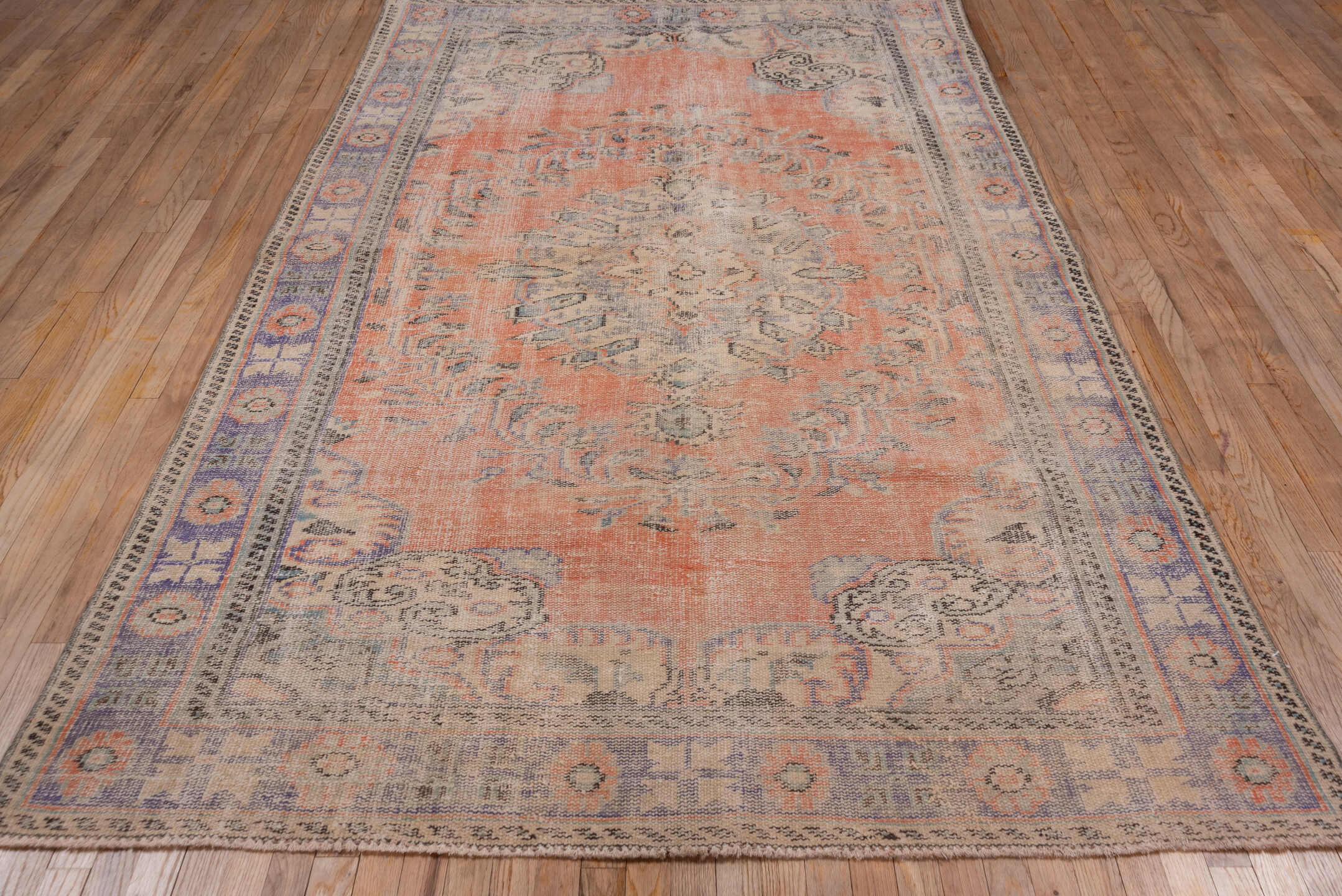 6' x 10' one-of-a-kind handmade vintage Sparta large size rug. Color palette: coral, lavender, ivory, taupe, slate, peach
