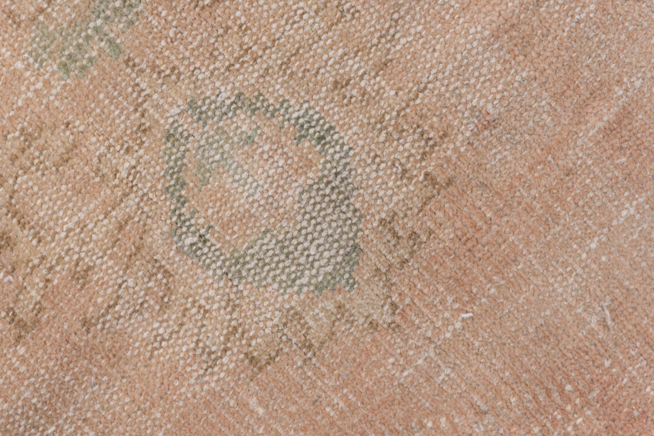 5' x 9' one-of-a-kind handmade vintage Sparta medium size rug. Color palette: blush, ivory, sage, cream, taupe, pink, green
