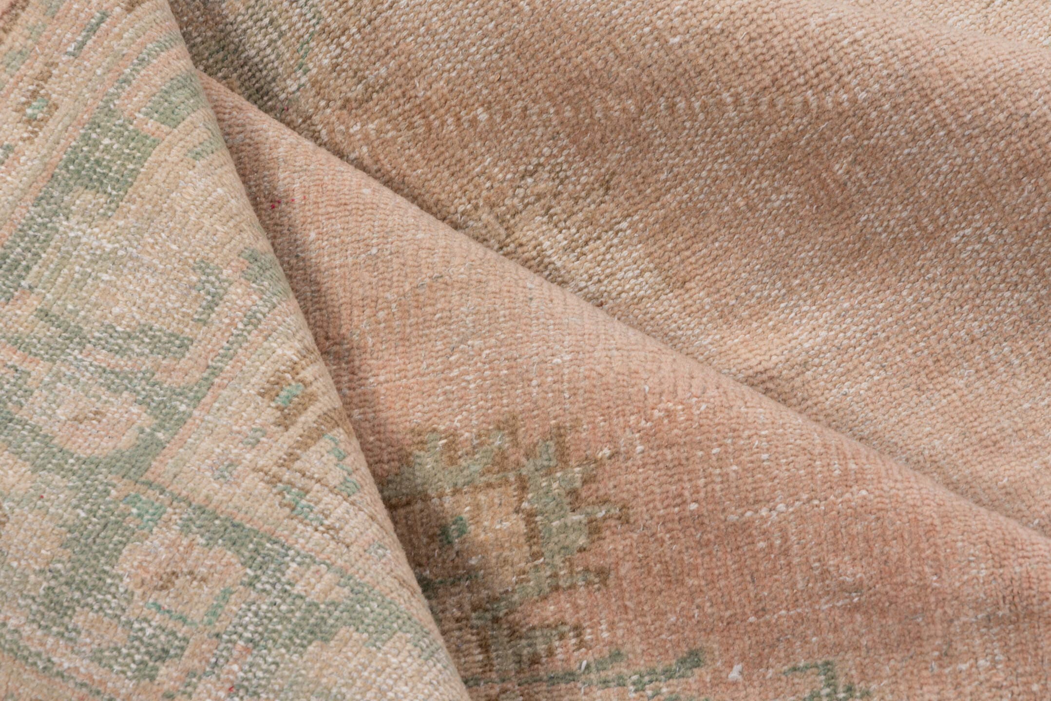 5' x 9' one-of-a-kind handmade vintage Sparta medium size rug. Color palette: blush, ivory, sage, cream, taupe, pink, green