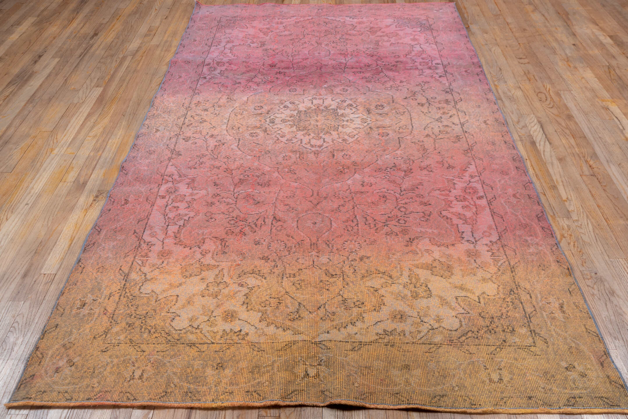 5' x 9' one-of-a-kind handmade vintage Sparta medium size rug. Color palette: rose, blush, apricot, gold, terra cotta, taupe
