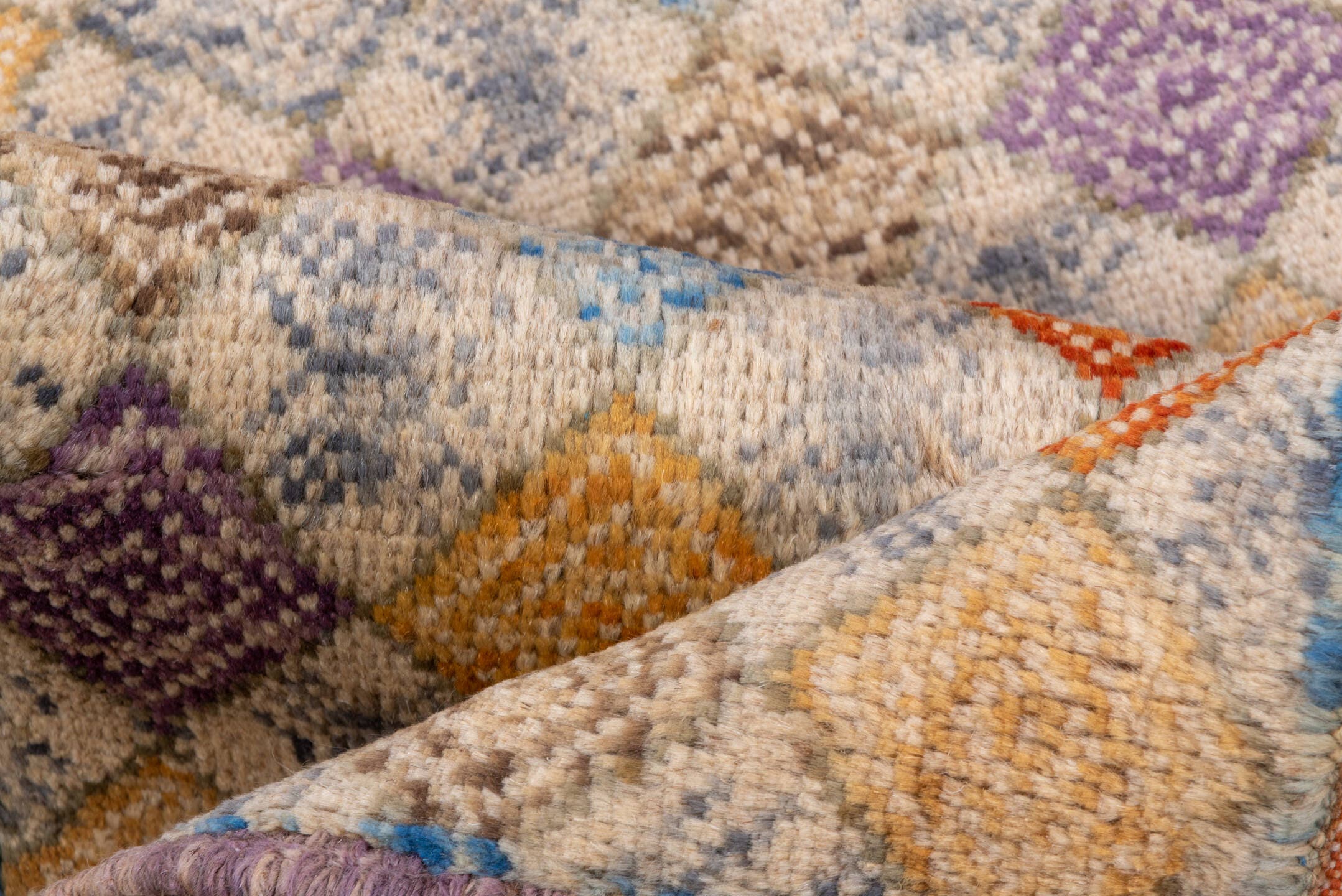 2' x 5' one-of-a-kind handmade vintage Gabbe small size rug. Color palette: ivory, gold, lavender, rust, sky blue, camel