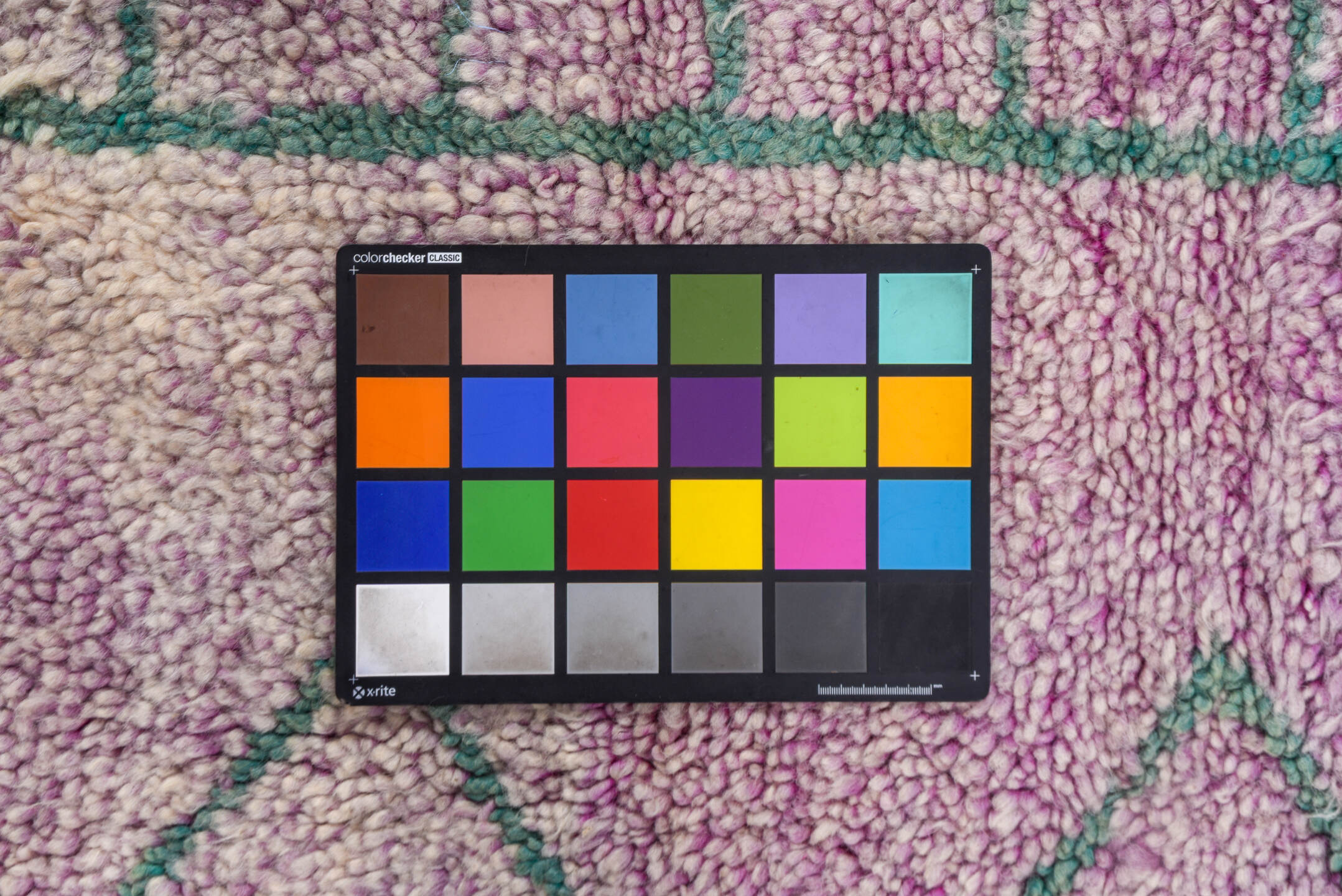 5' x 6' one-of-a-kind handmade vintage Moroccan rug. Color palette: brown, gray, light gray, pink, red