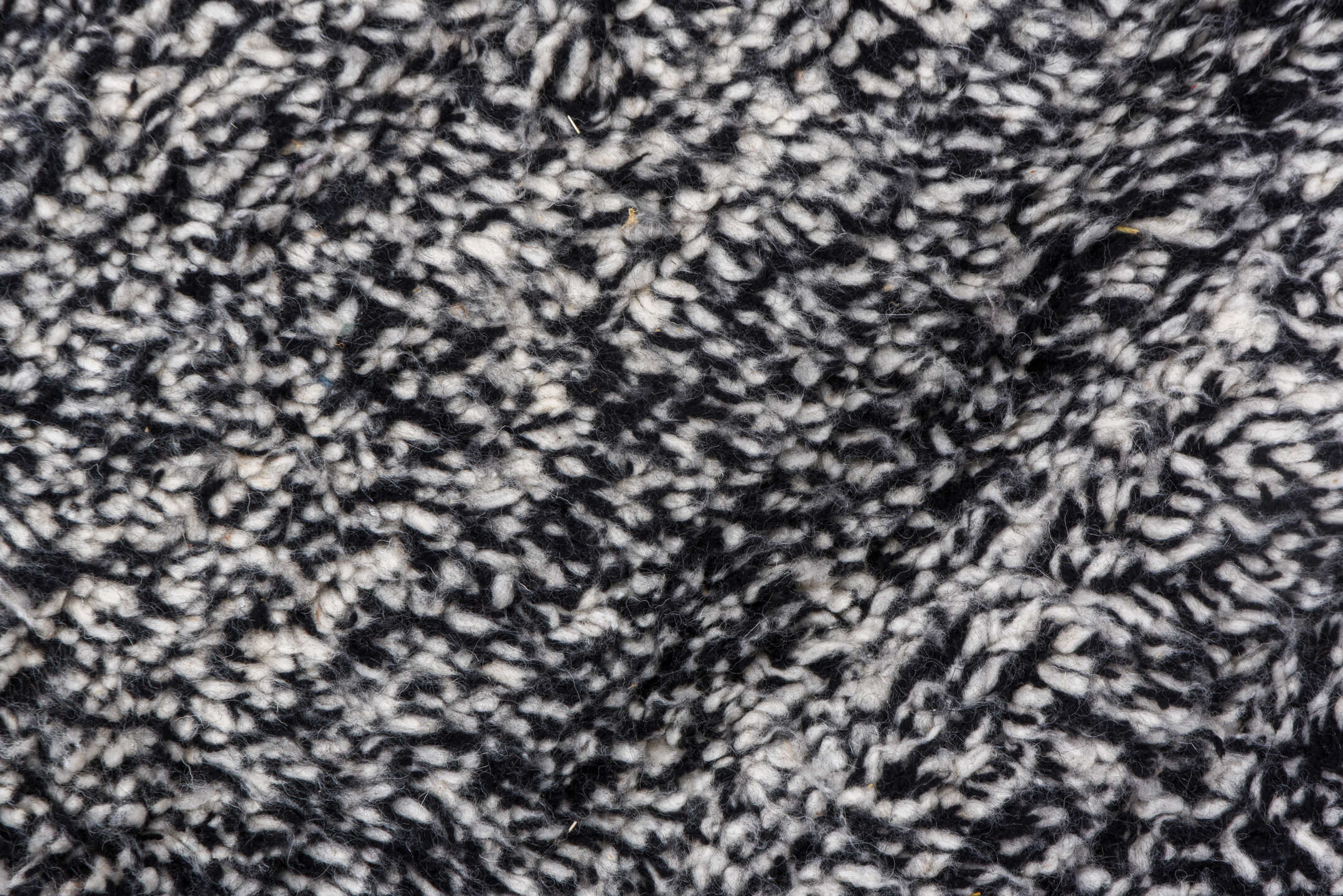 5' x 7' one-of-a-kind handmade vintage Moroccan rug. Color palette: charcoal, ivory, black, cream, gray