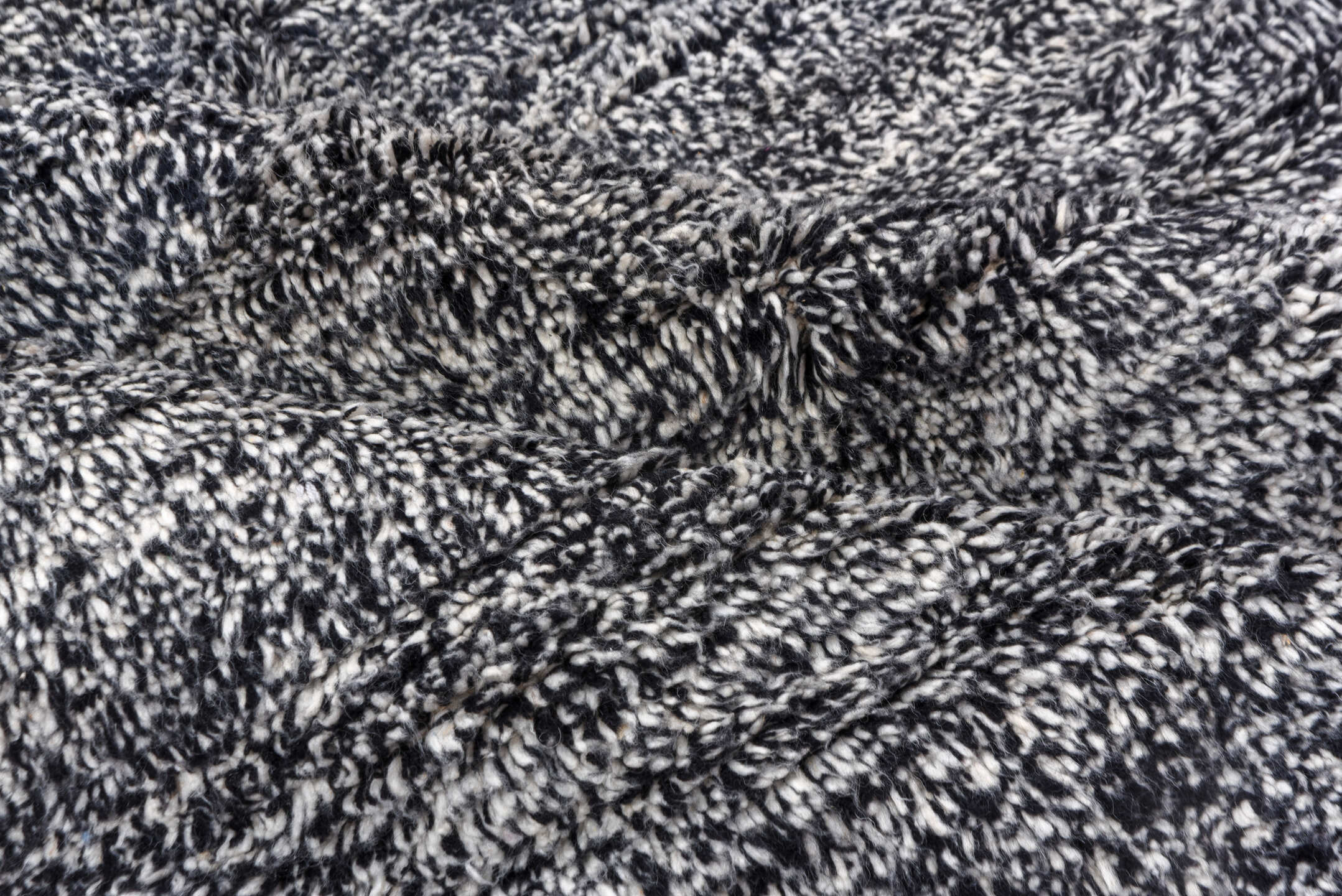 5' x 7' one-of-a-kind handmade vintage Moroccan rug. Color palette: charcoal, ivory, black, cream, gray