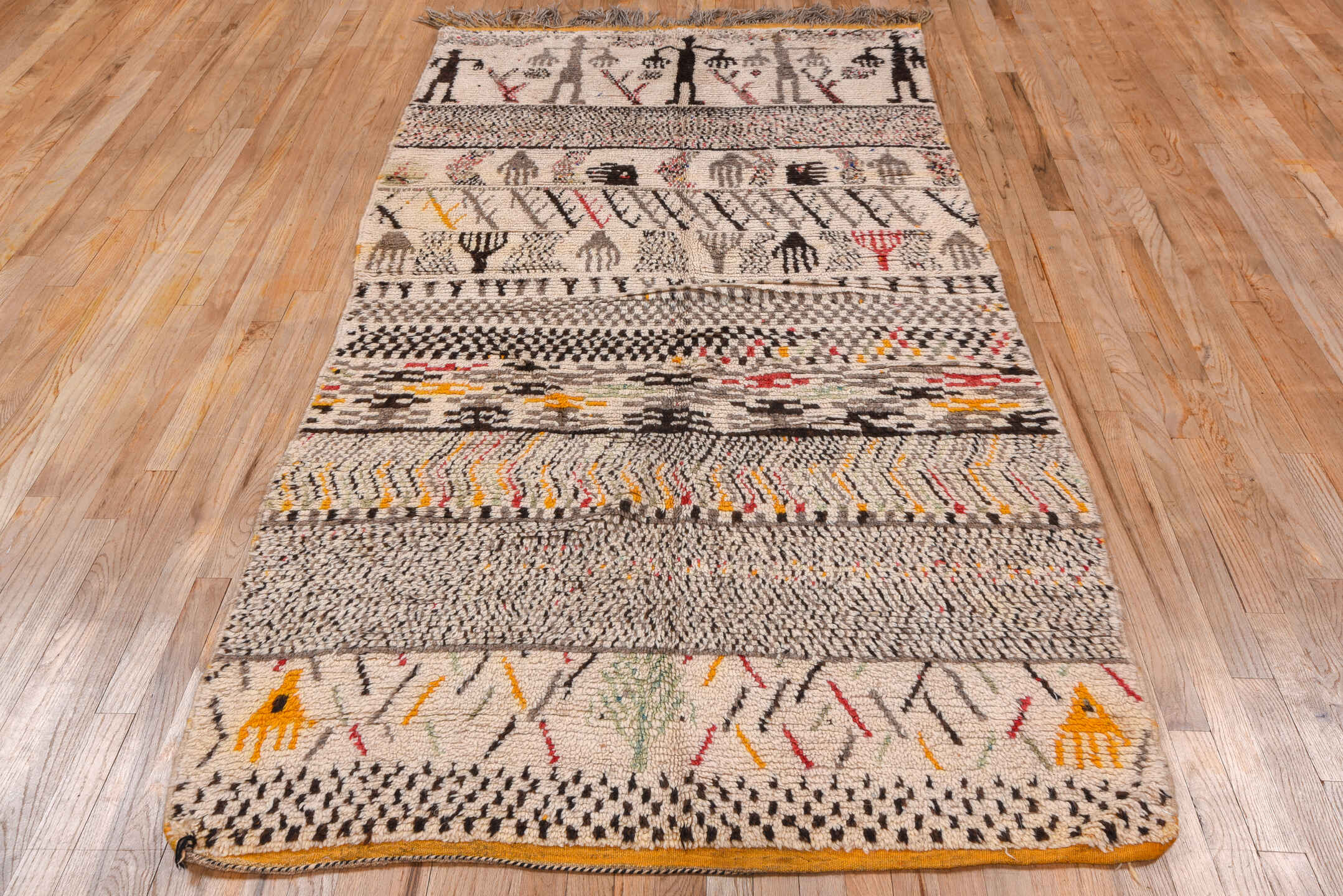4' x 8' one-of-a-kind handmade vintage Moroccan rug. Color palette: brown, gray, light gray, off-white, orange, peru, pink