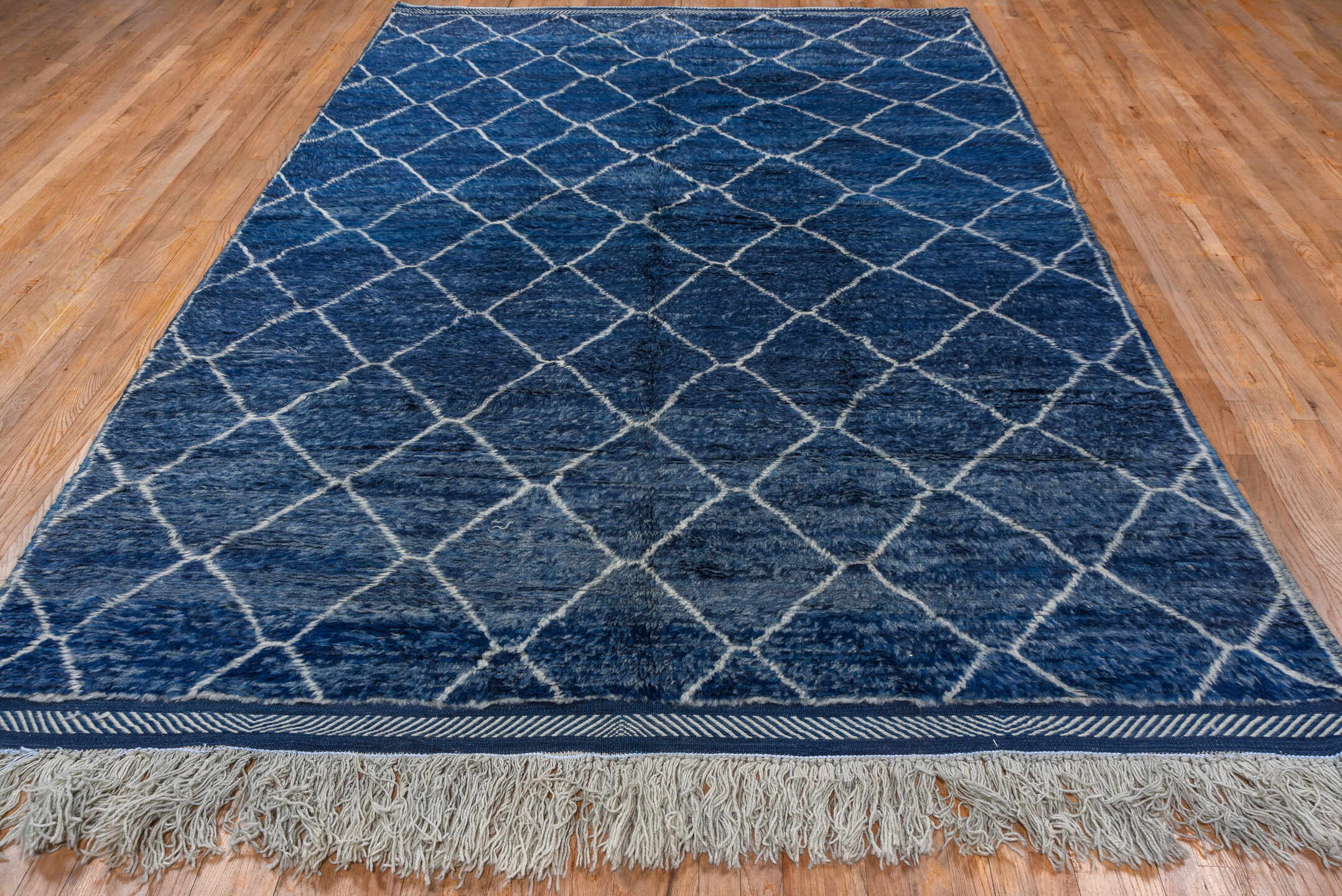 7' x 10' one-of-a-kind handmade vintage Moroccan large size rug. Color palette: arapawa, blue, dark gray, gray, light blue