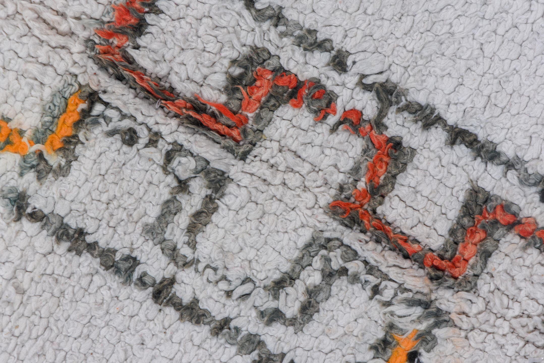 5' x 8' one-of-a-kind handmade vintage Moroccan medium size rug. Color palette: ivory, charcoal, rust, saffron, gray, black