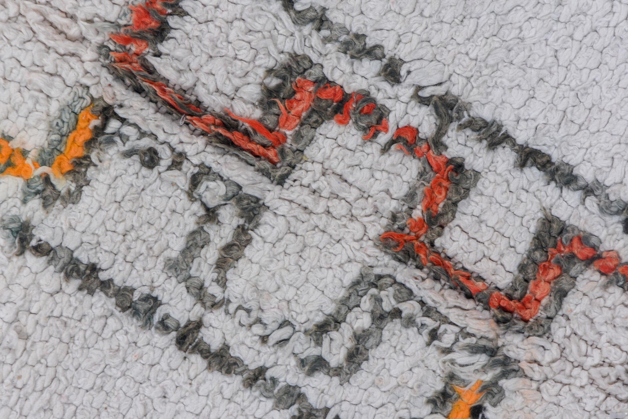 5' x 8' one-of-a-kind handmade vintage Moroccan medium size rug. Color palette: ivory, charcoal, rust, saffron, gray, black