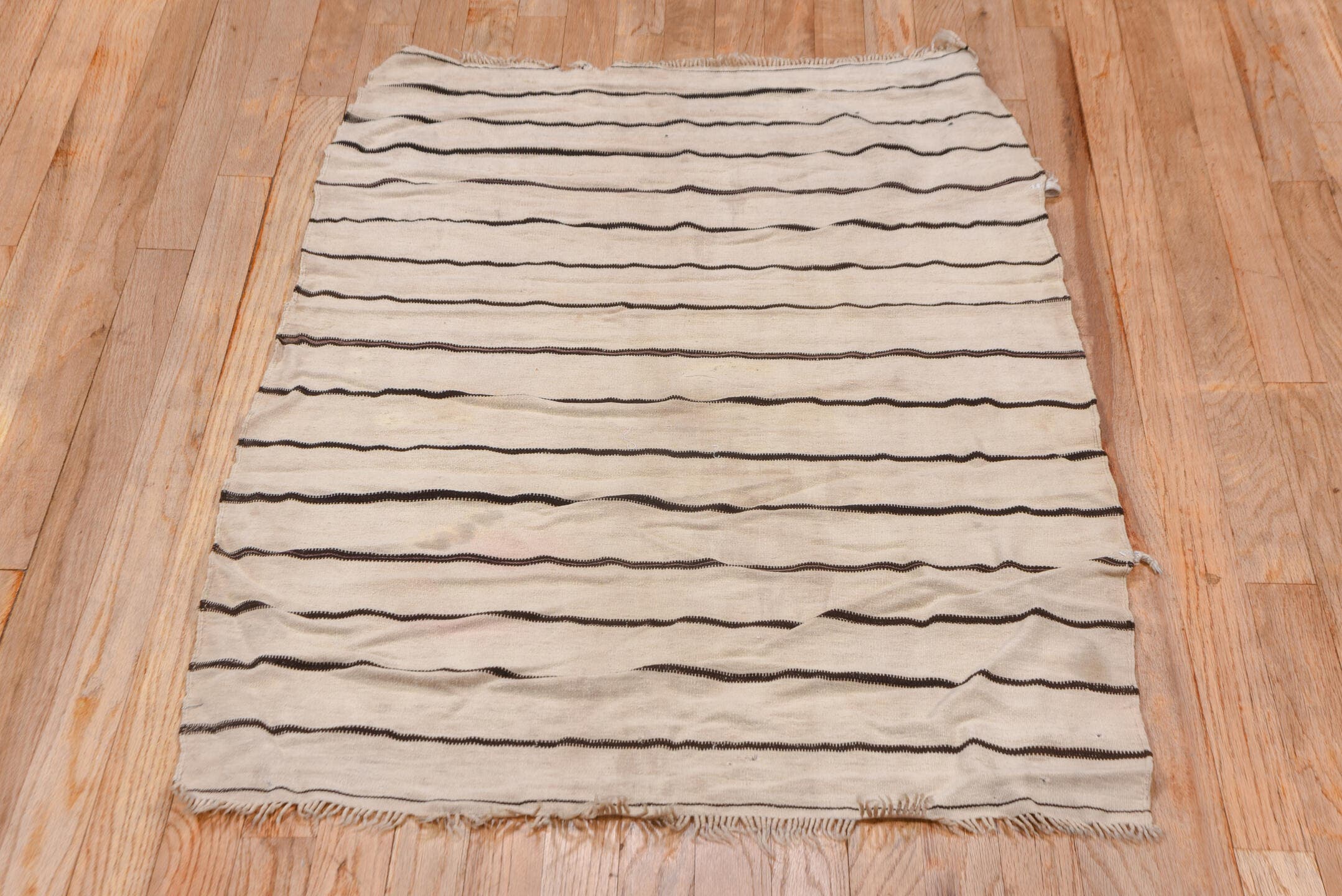 2' x 3' one-of-a-kind handmade vintage Textile small size rug. Color palette: ivory, charcoal, cream, taupe, gray, black