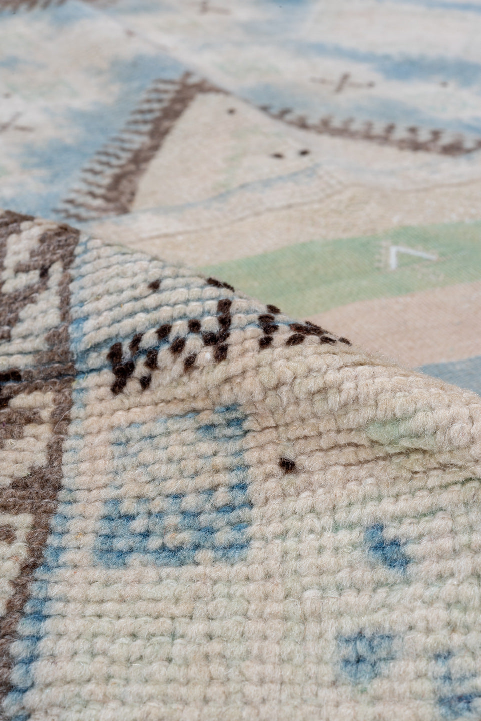 6' x 9' one-of-a-kind handmade antique Moroccan medium size rug. Color palette: ivory, pale blue, sage, blush, taupe, brown