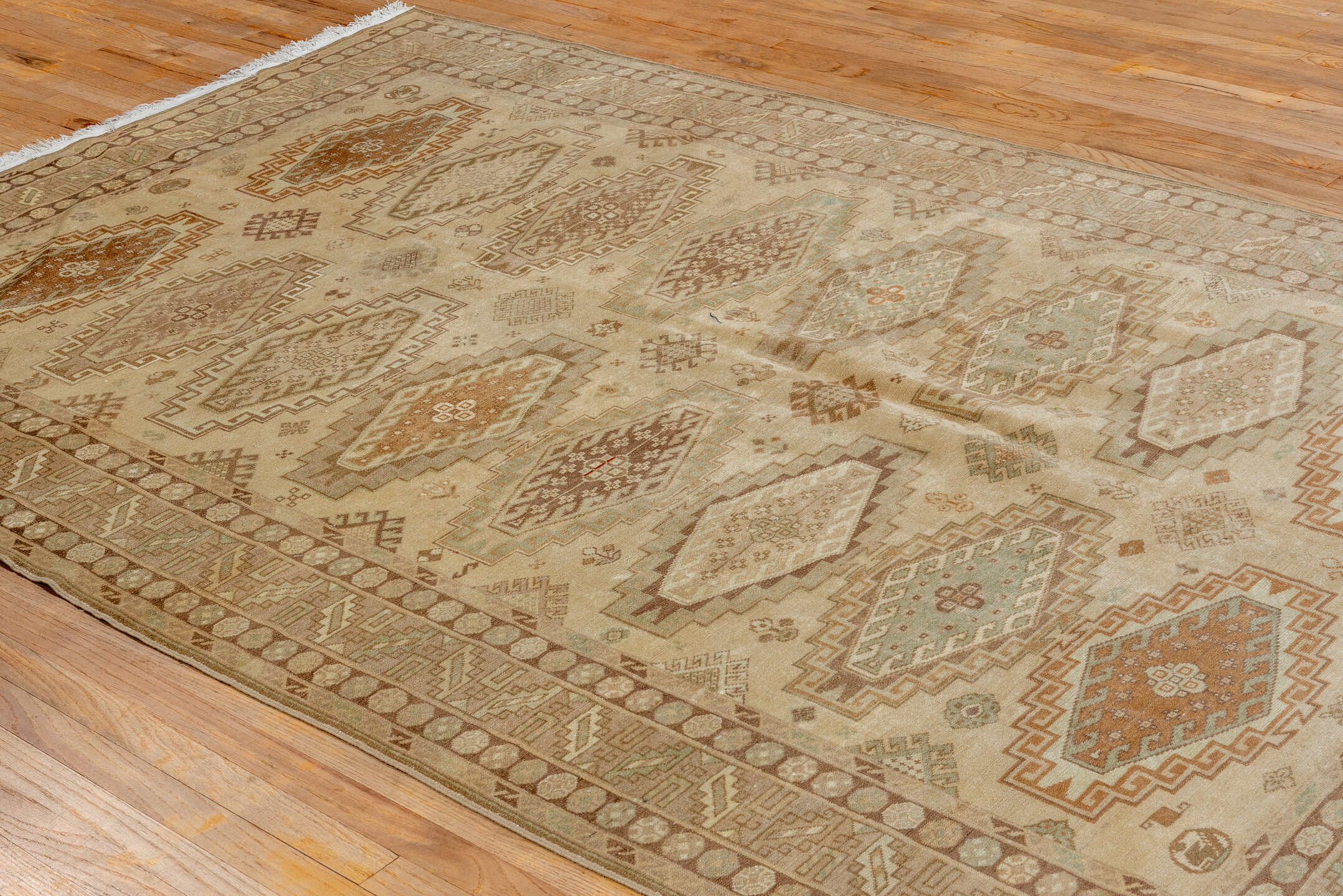 6' x 9' one-of-a-kind handmade antique Derband medium size rug. Color palette: ivory, taupe, camel, sage, brown, sand, rust