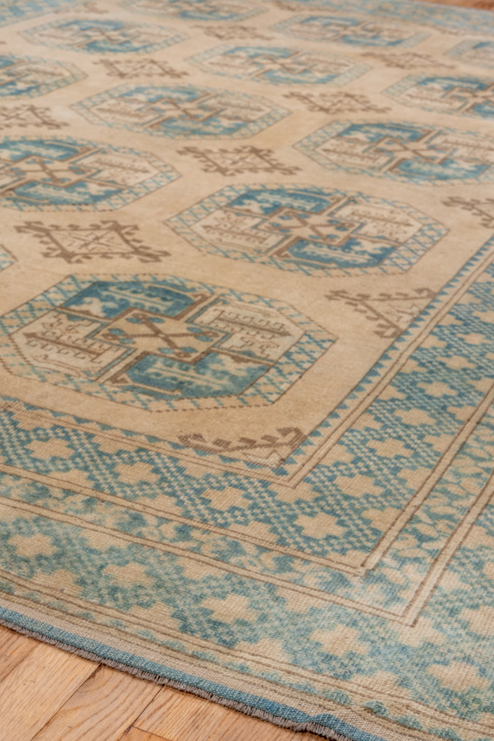 7' x 10' one-of-a-kind handmade antique Afghan large size rug. Color palette: ivory, aqua, beige, taupe, camel, teal, gray