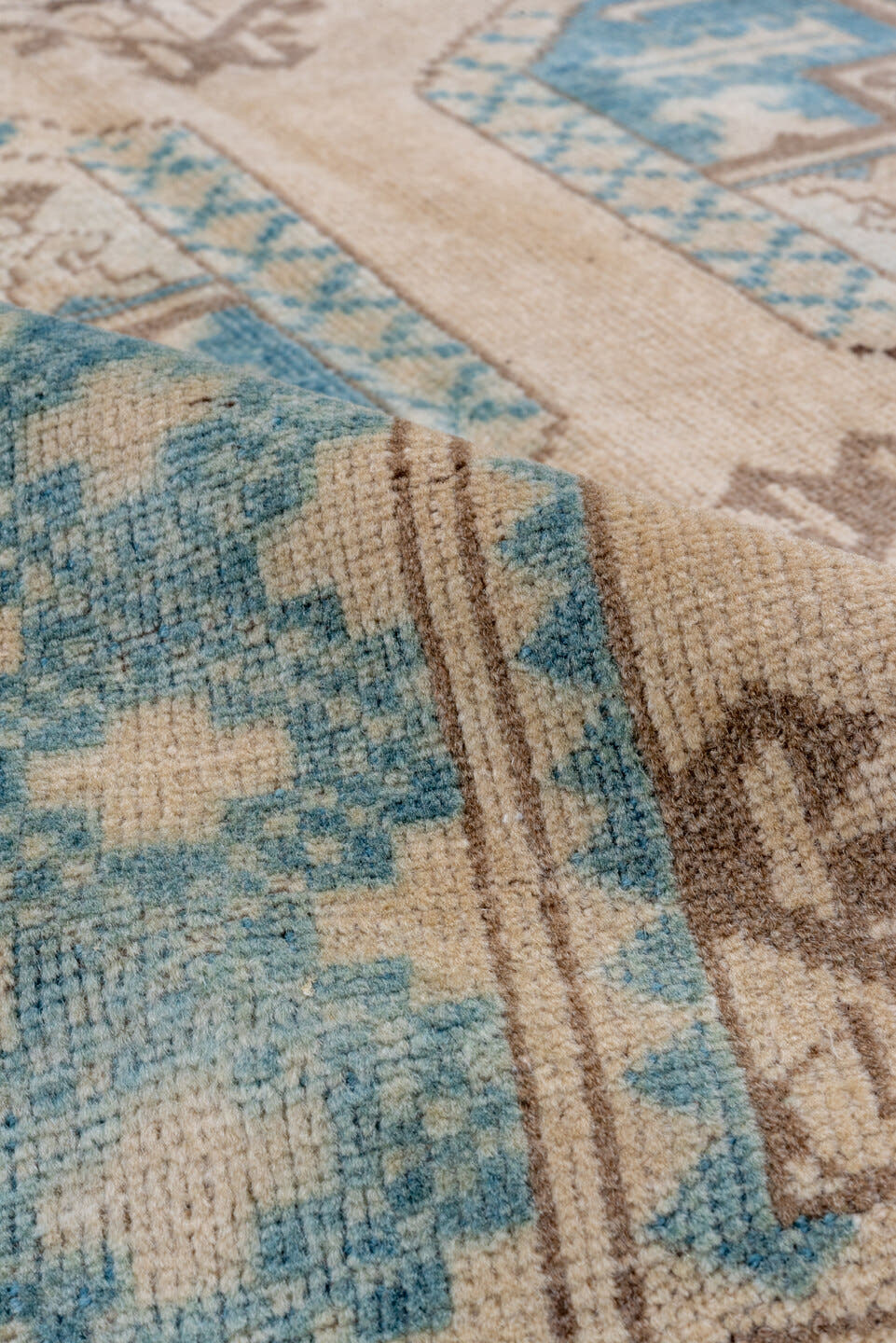 7' x 10' one-of-a-kind handmade antique Afghan large size rug. Color palette: ivory, aqua, beige, taupe, camel, teal, gray