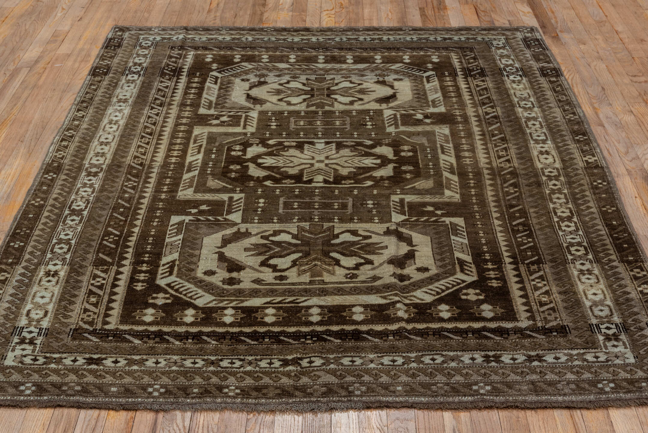 5' x 7' one-of-a-kind handmade vintage Kars rug. Color palette: brown, gray, pink